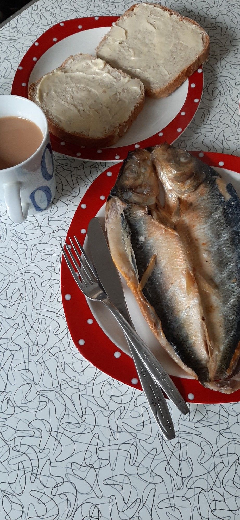 Poached kipper, bread & butter, mug of tea.