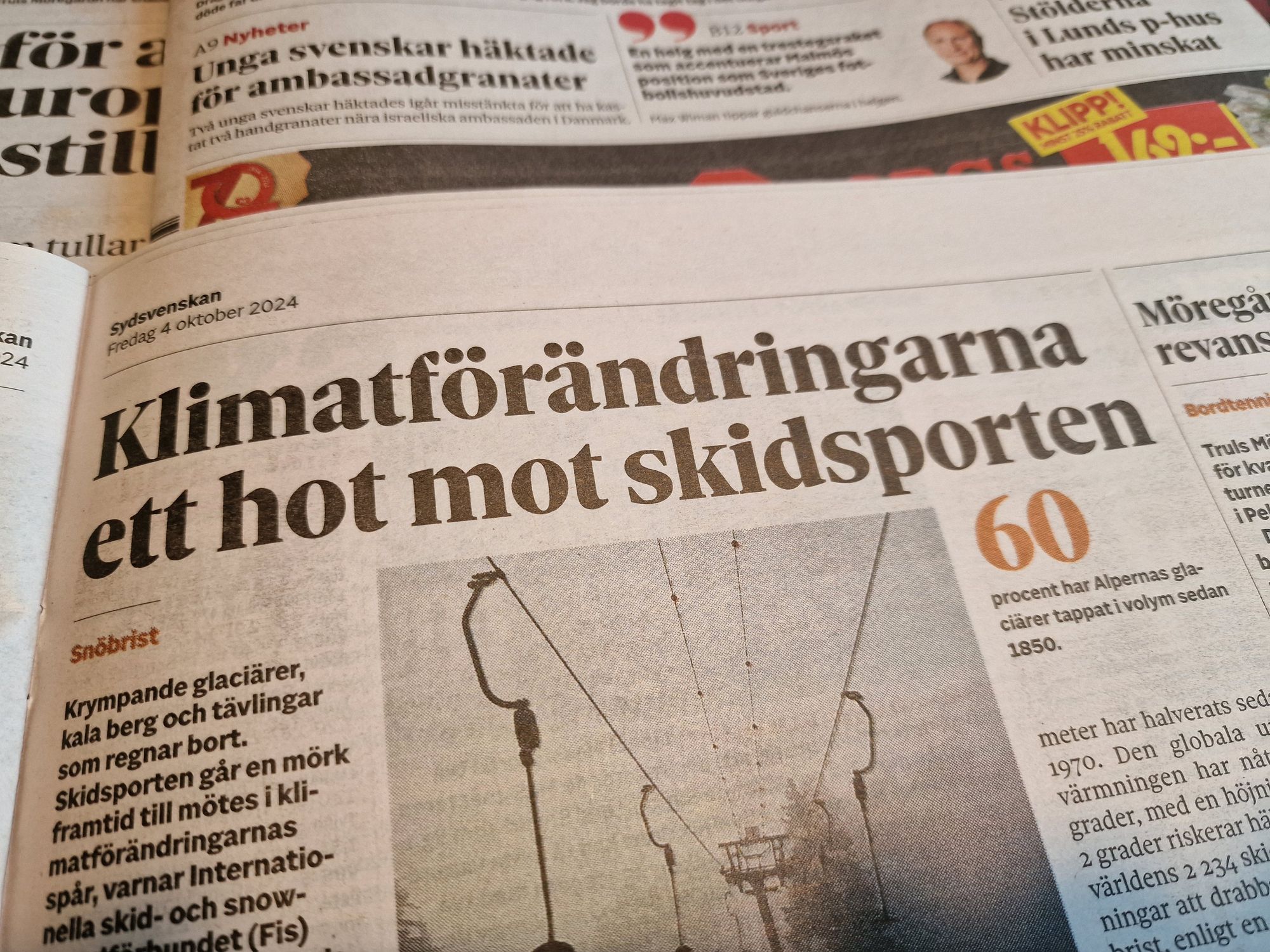 Tidningsrubrik: Klimatförändringarna ett hot mot skidsporten.