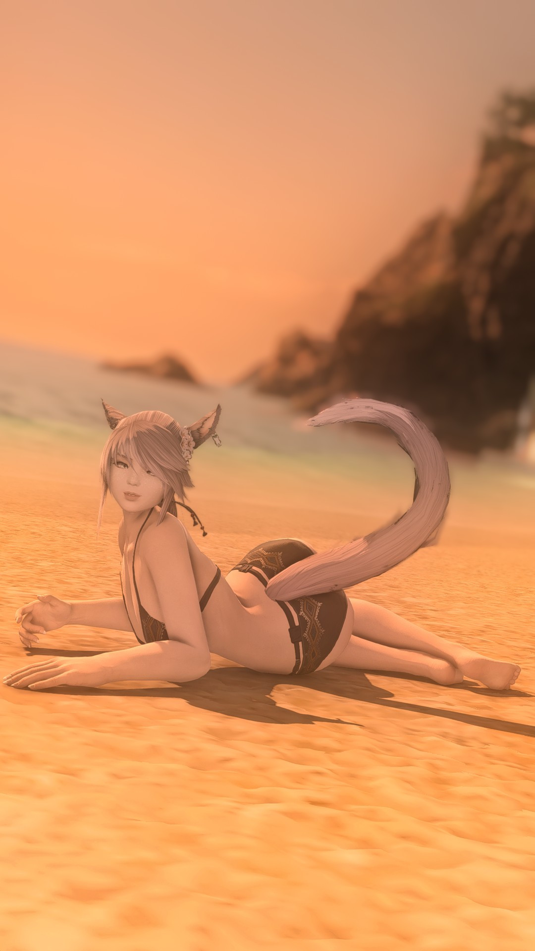 Fox trying to look sexy on her side this time for a beach shot