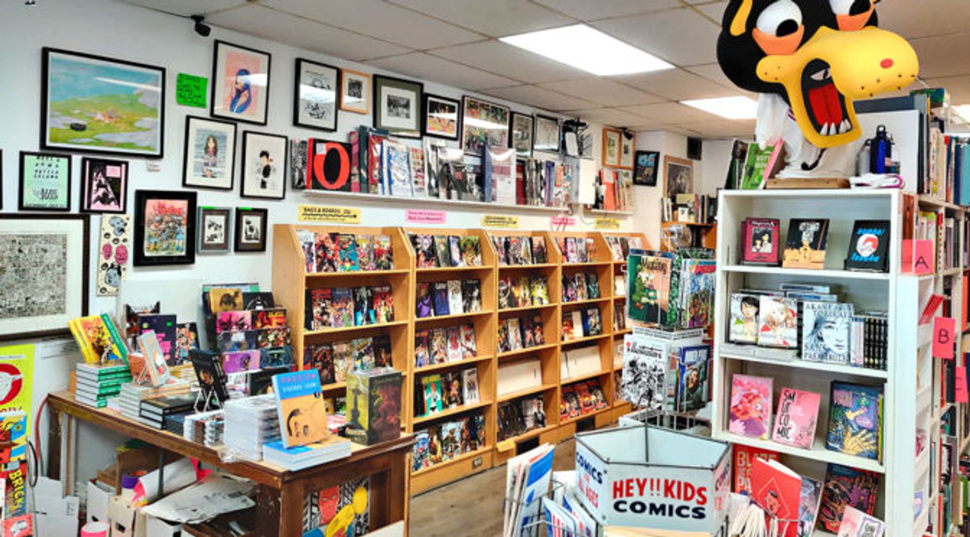 The inside of The Beguiling, showing new weekly comics and graphic novels on display.