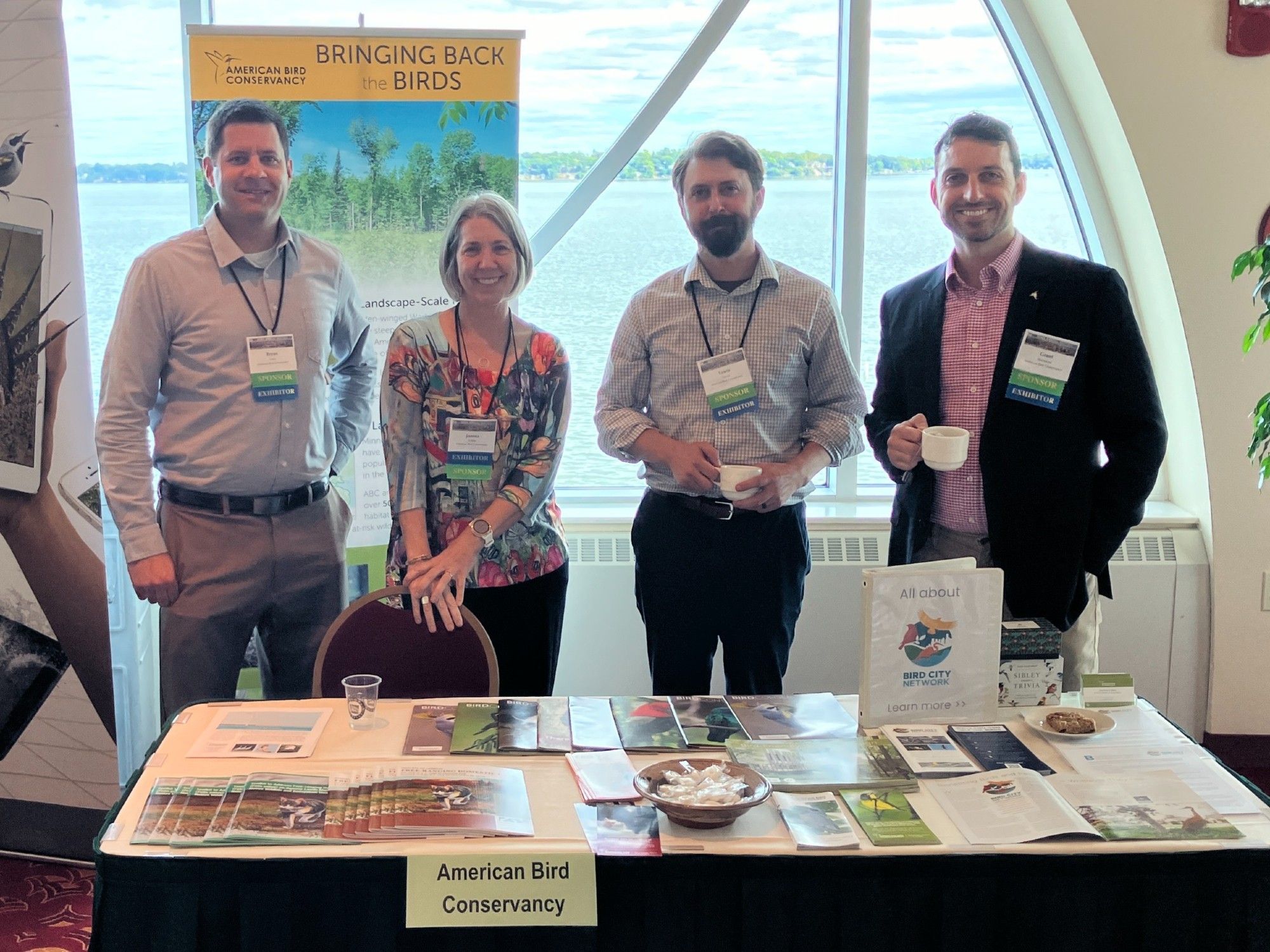 Bryan Lenz, Joanna Eckles, Lewis Grove, and Grant Sizemore at the ABC outreach booth.