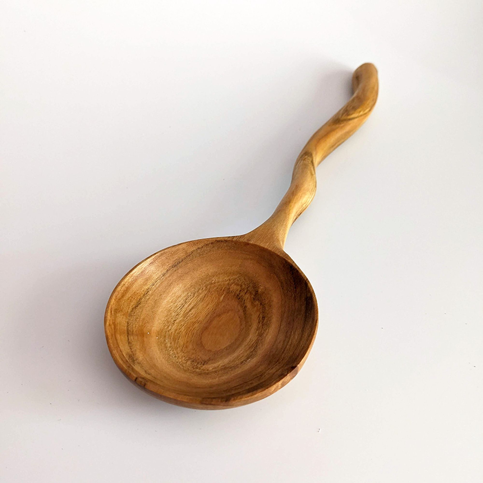 Applewood Spoon with a large circular bowl and serpentine handle