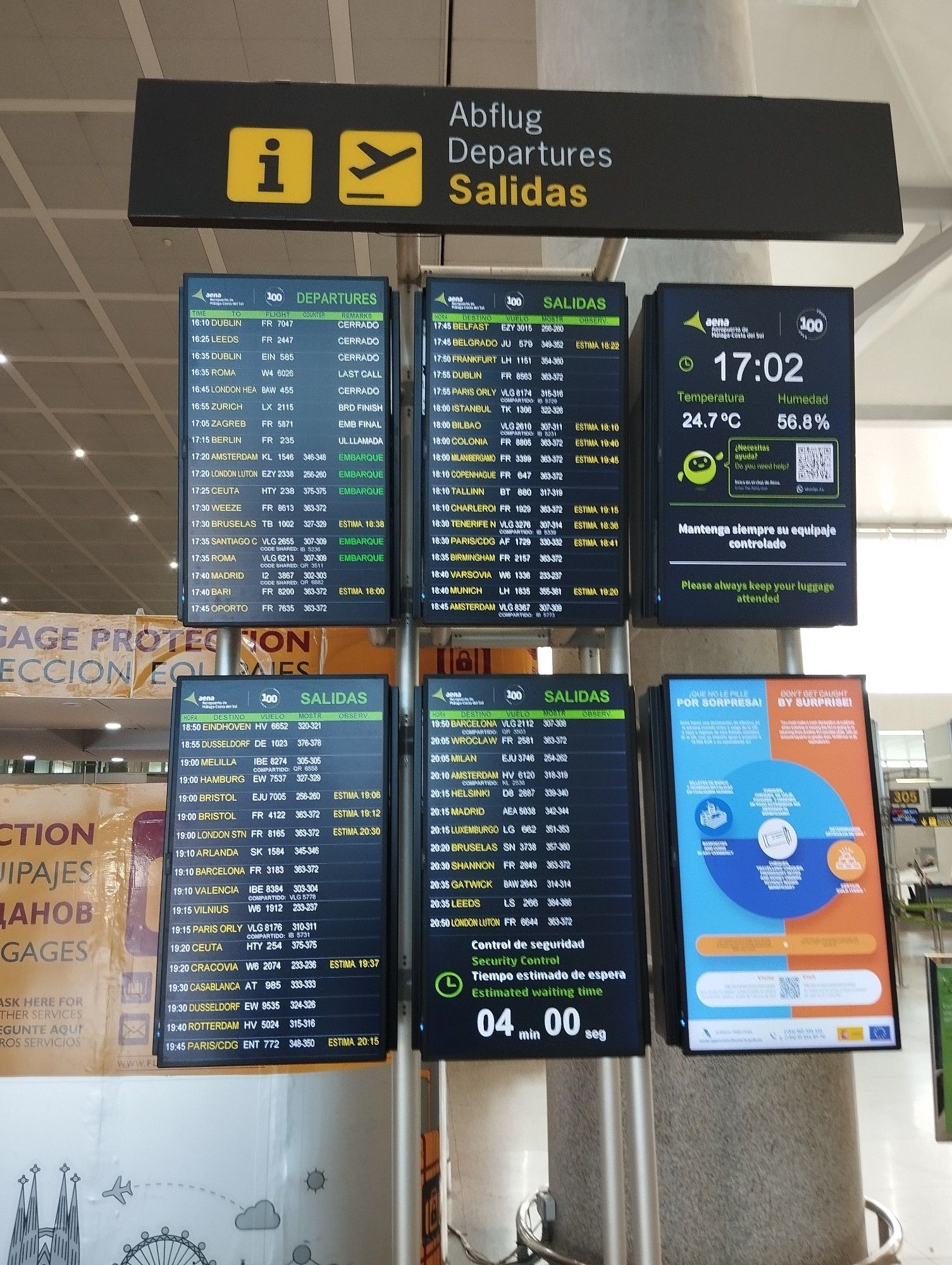 Photo of flight departure board at Malaga Airport.