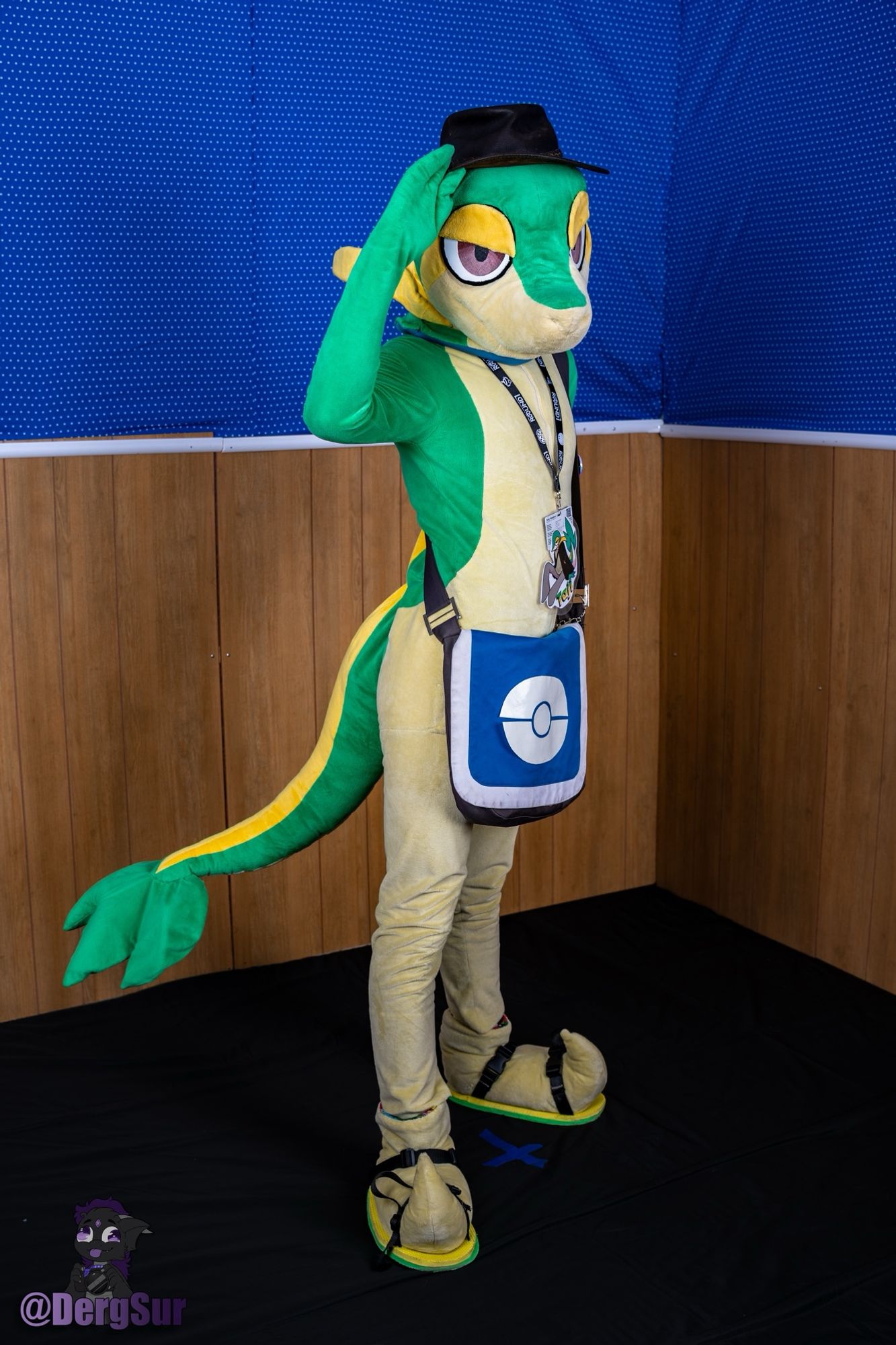 Snivy fursuit with a cowboy hat on