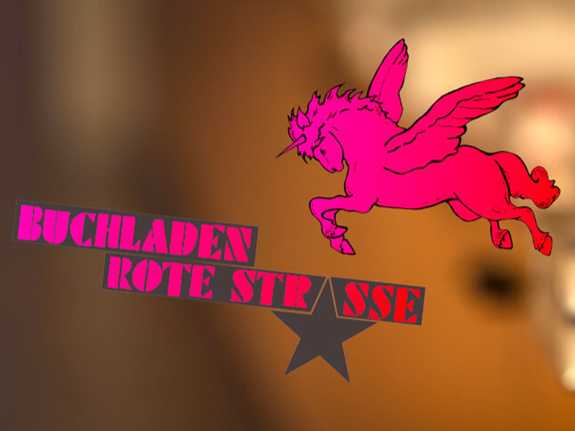 Logo vom Buchladen Rote Straße mit fliegendem rosa Einhorn