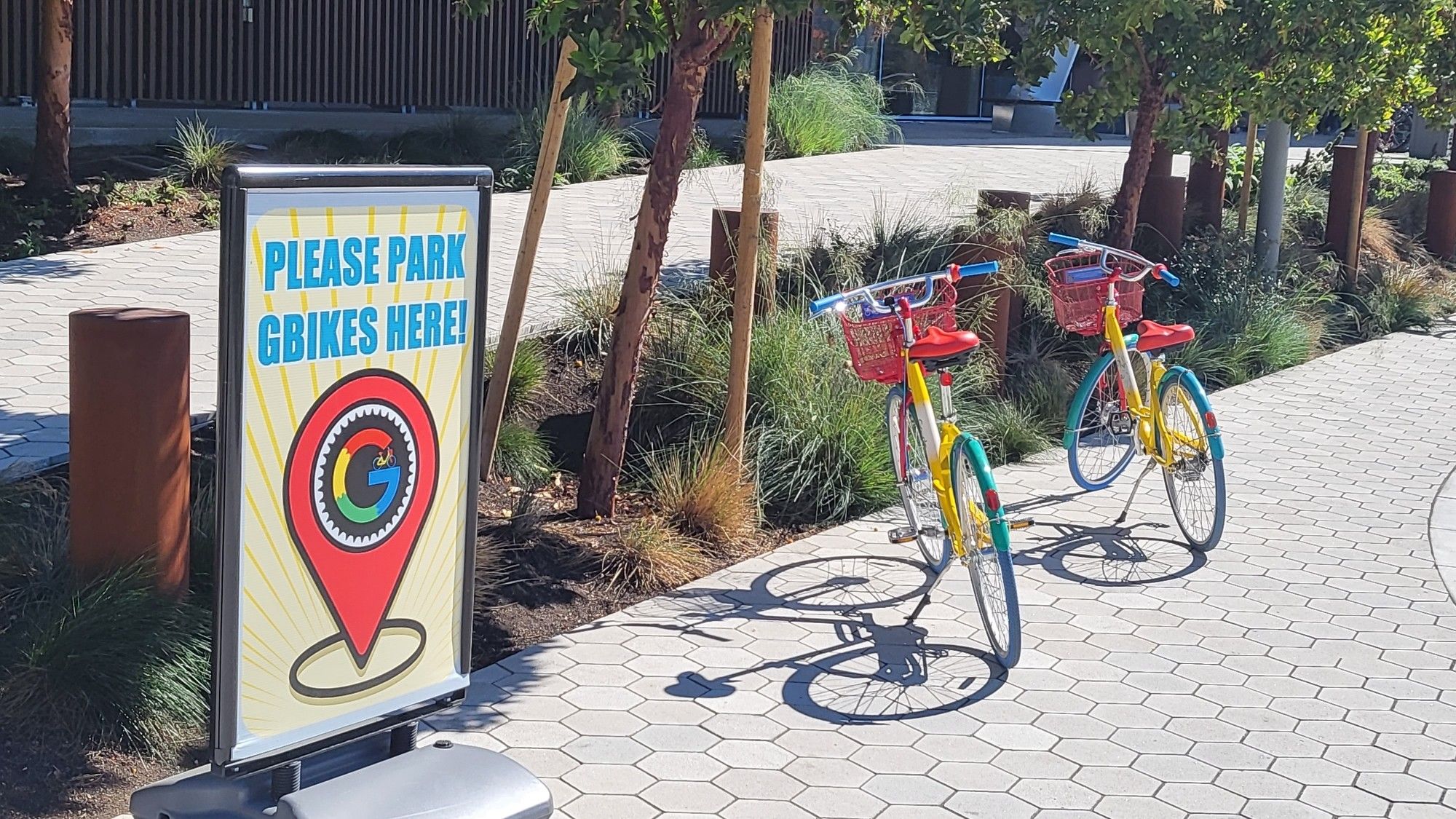 The picture shows in front of the Google Visitor Experience a parking place for GBikes.