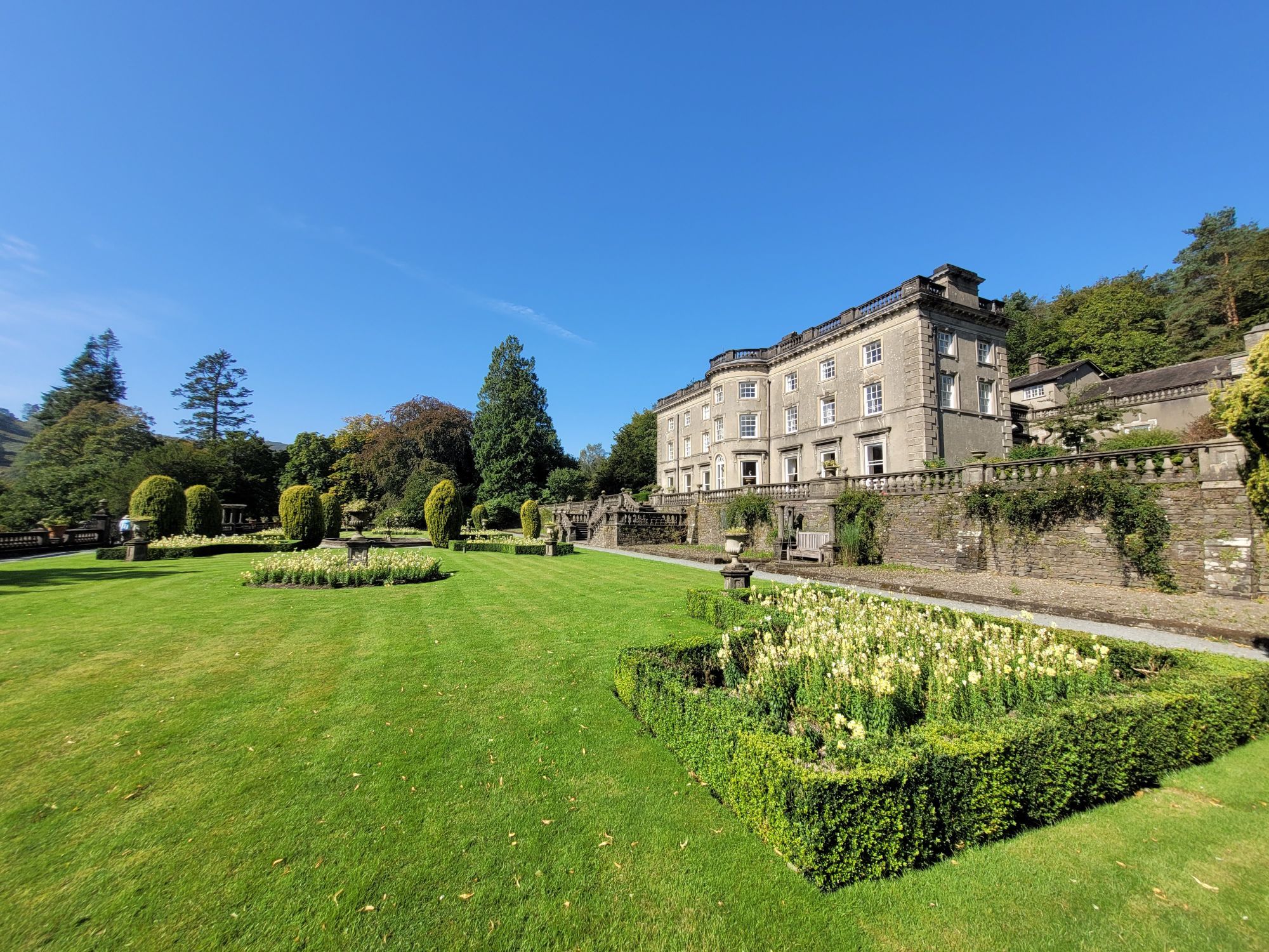 Photograph of Rydal Hall and its gardens in the sunshine