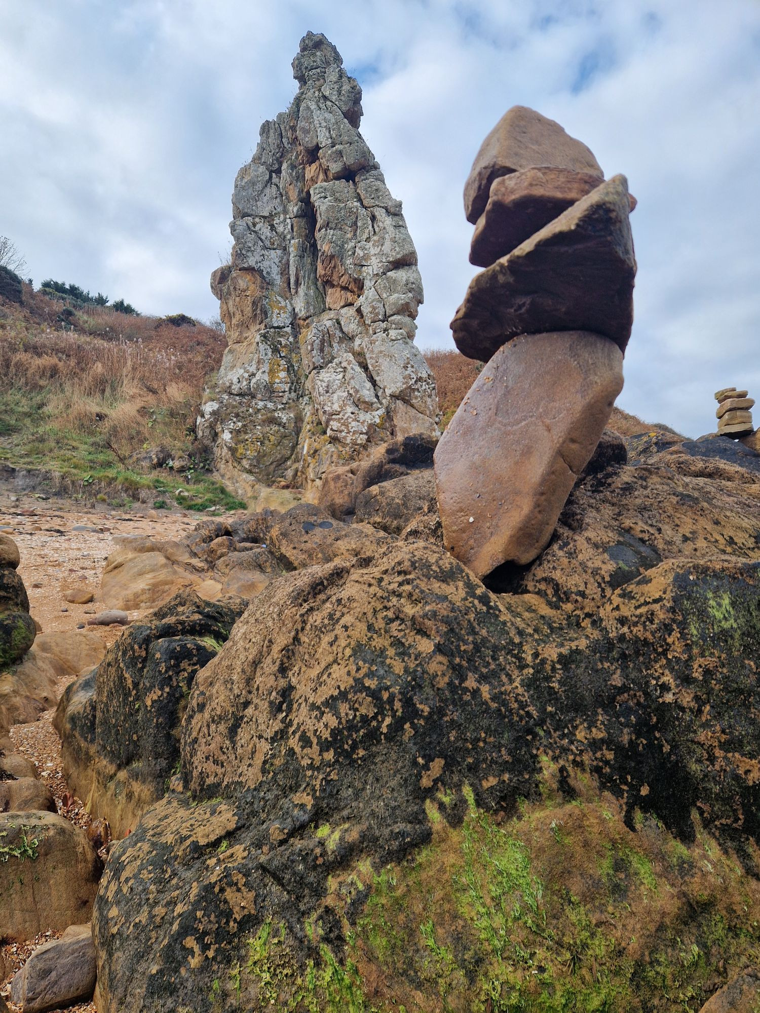 Stone stack beside the Maiden Rock long the coast at St Andrews