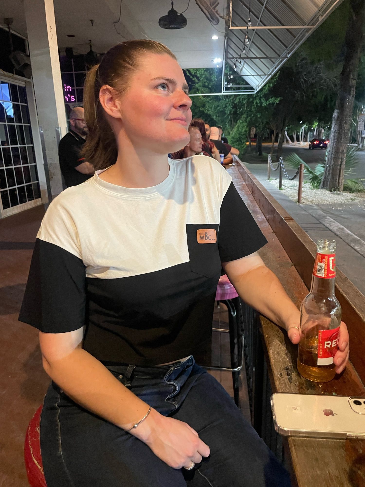 Gf looking cute on the porch of a bar