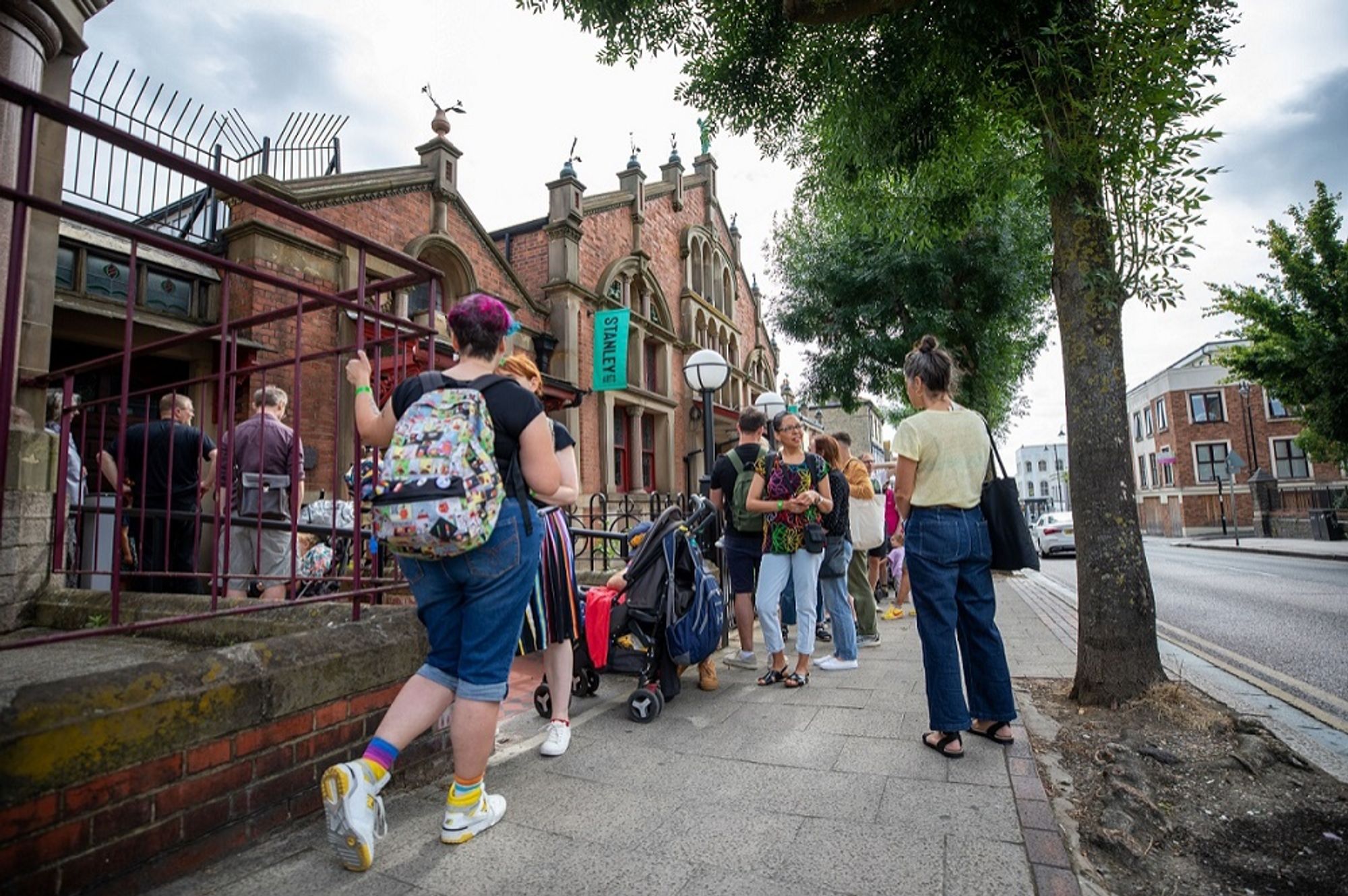 The exterior of Stanley Arts, Croydon, where people are lining up to enter. Credit - Jan Koblanski.