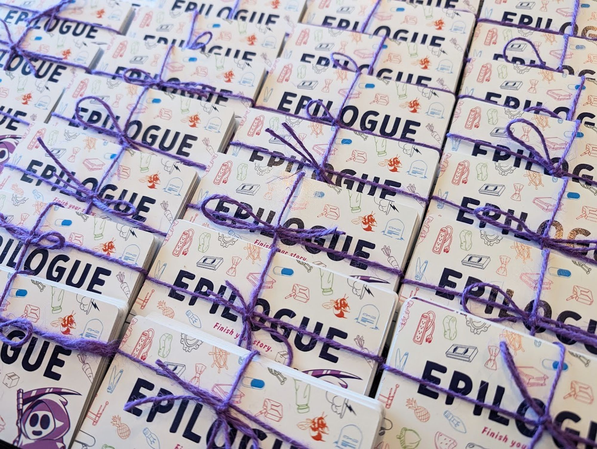 Many packs of review copies of the Epilogue games.