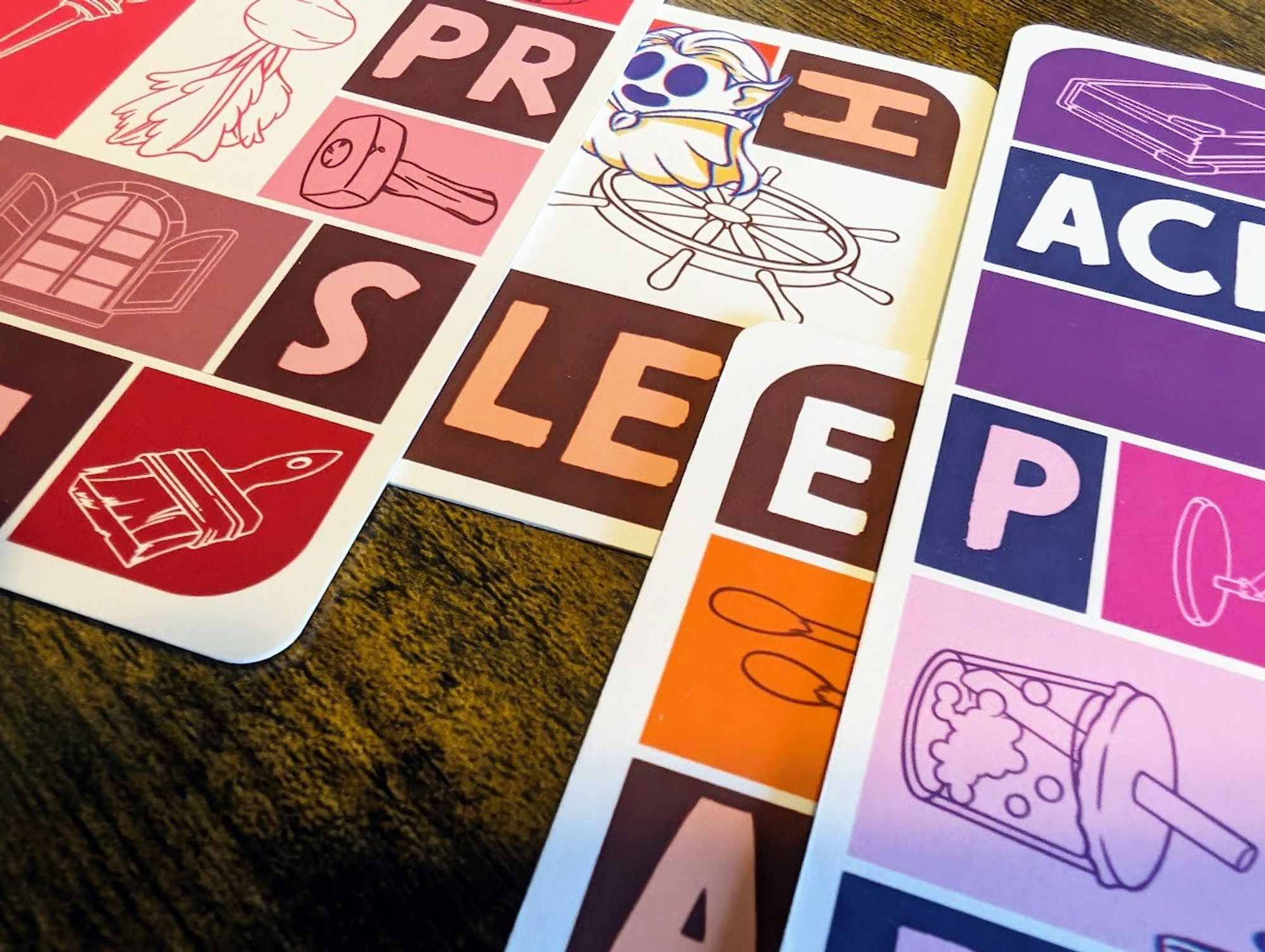 "Sleep" spelled out using 4 Epliogue cards.