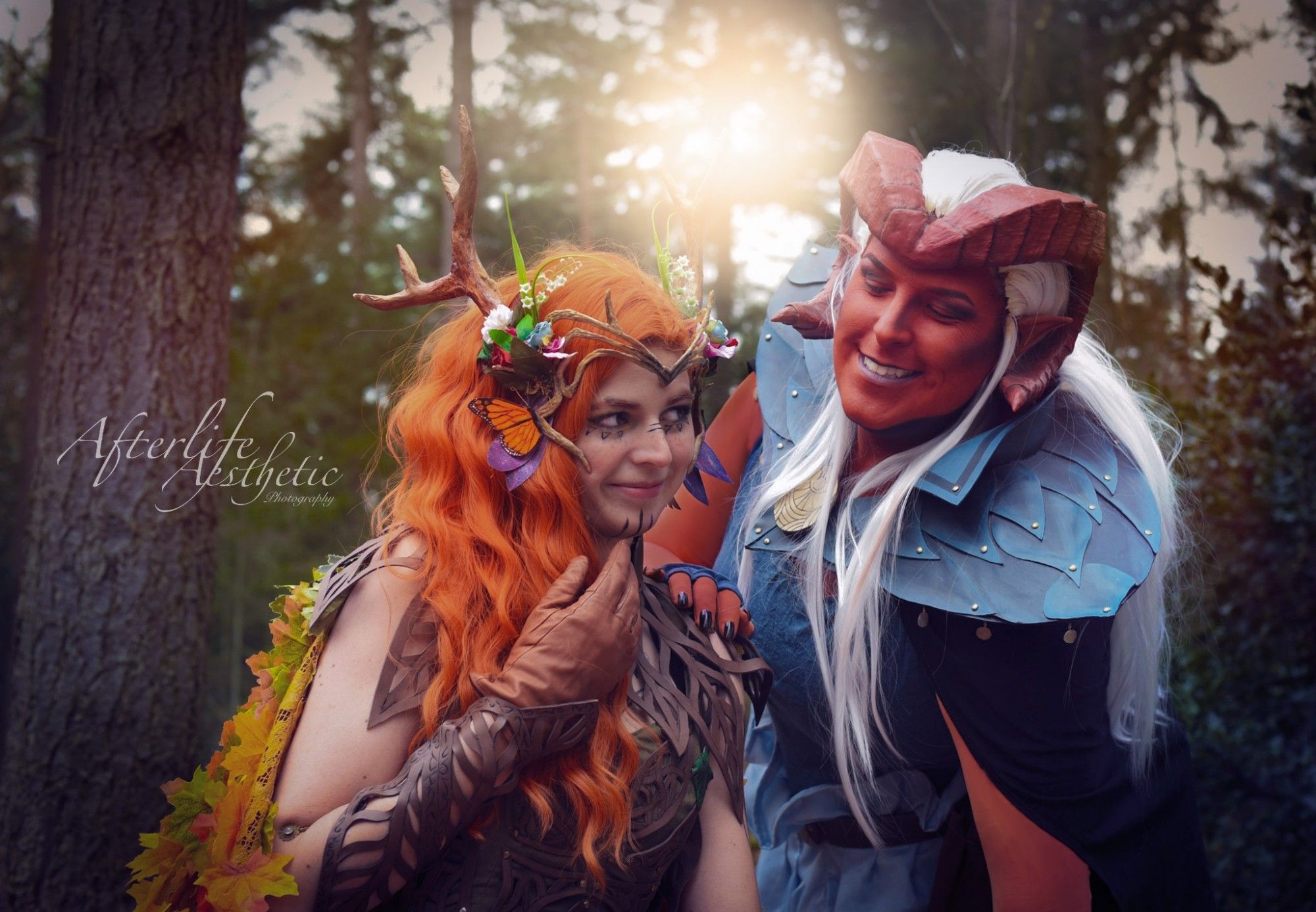 Keyleth cosplayer and Zahra cosplayer flirting in a forest setting