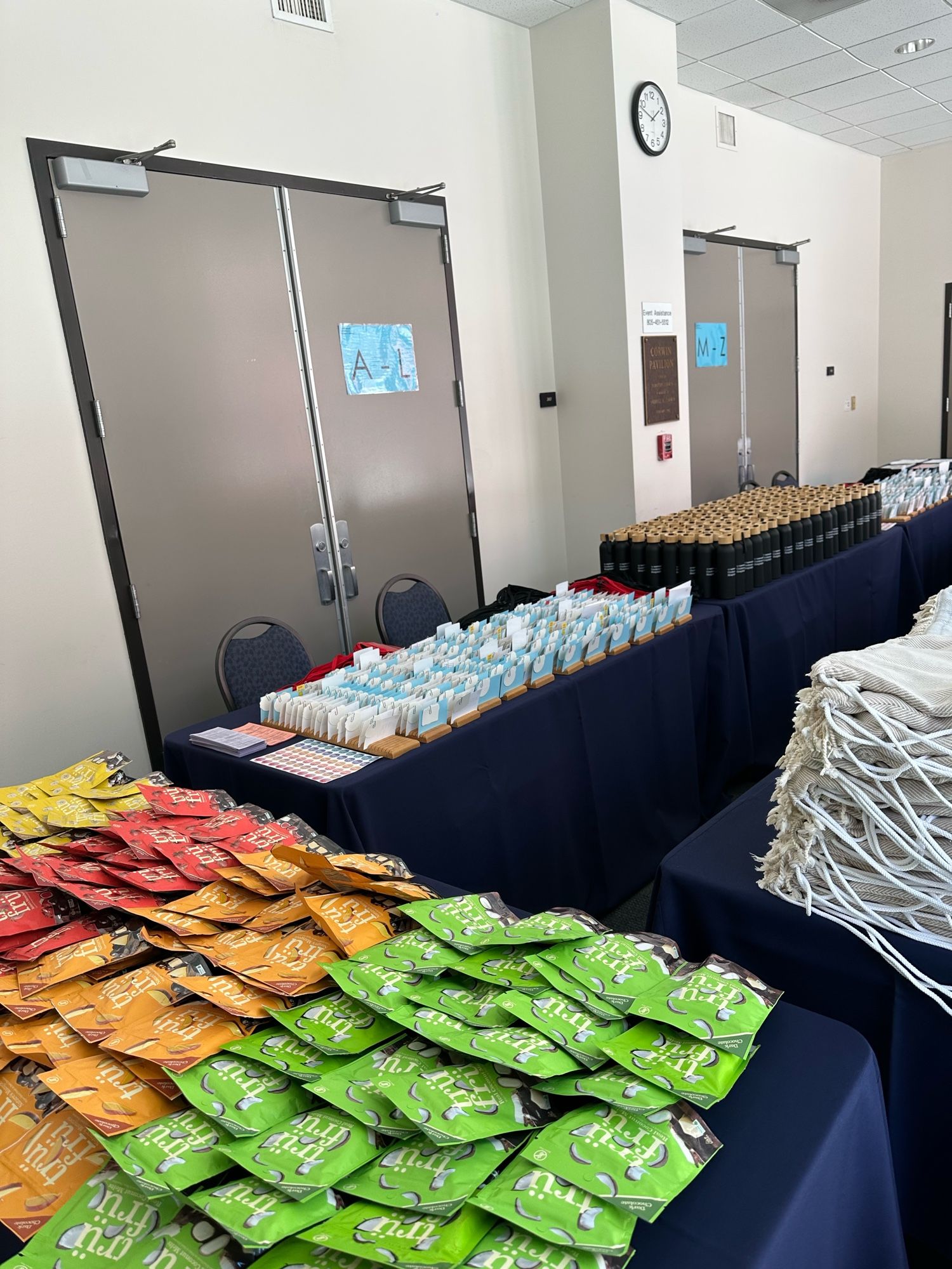 Registration desk with name badges and tru fru