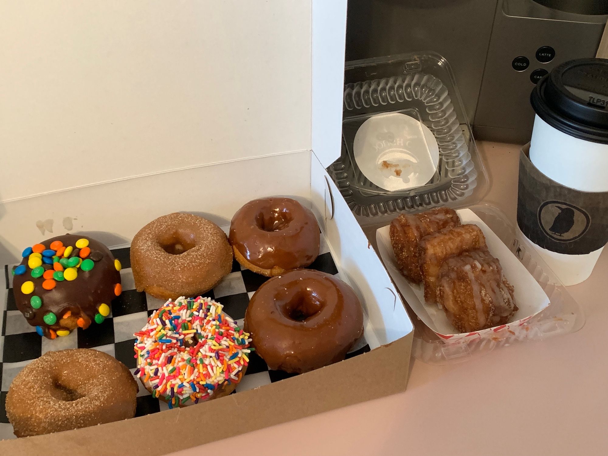 My walkHome breakfast Saturday of doughnuts, churro bites, and coffee. Support local businesses.