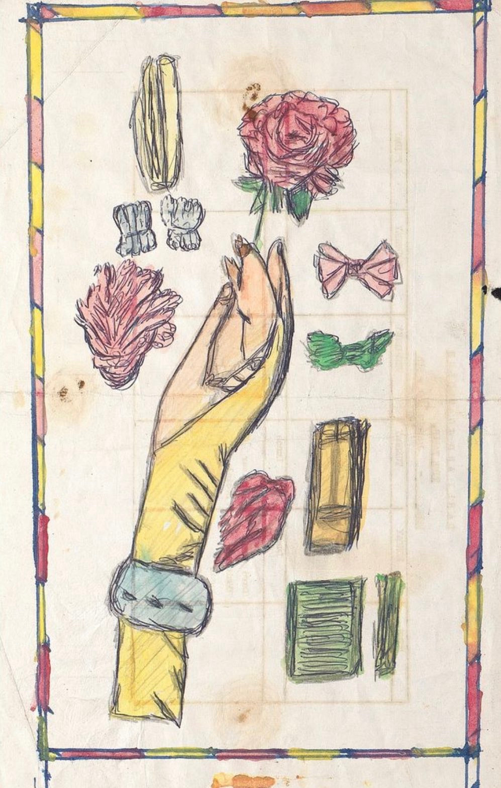 A drawing in biro and coloured pencil of a white hand with manicured nails holding a rose and surrounded by cosmetics & hair accessories, a rectangular yellow and red striped  border has been drawn around the outside