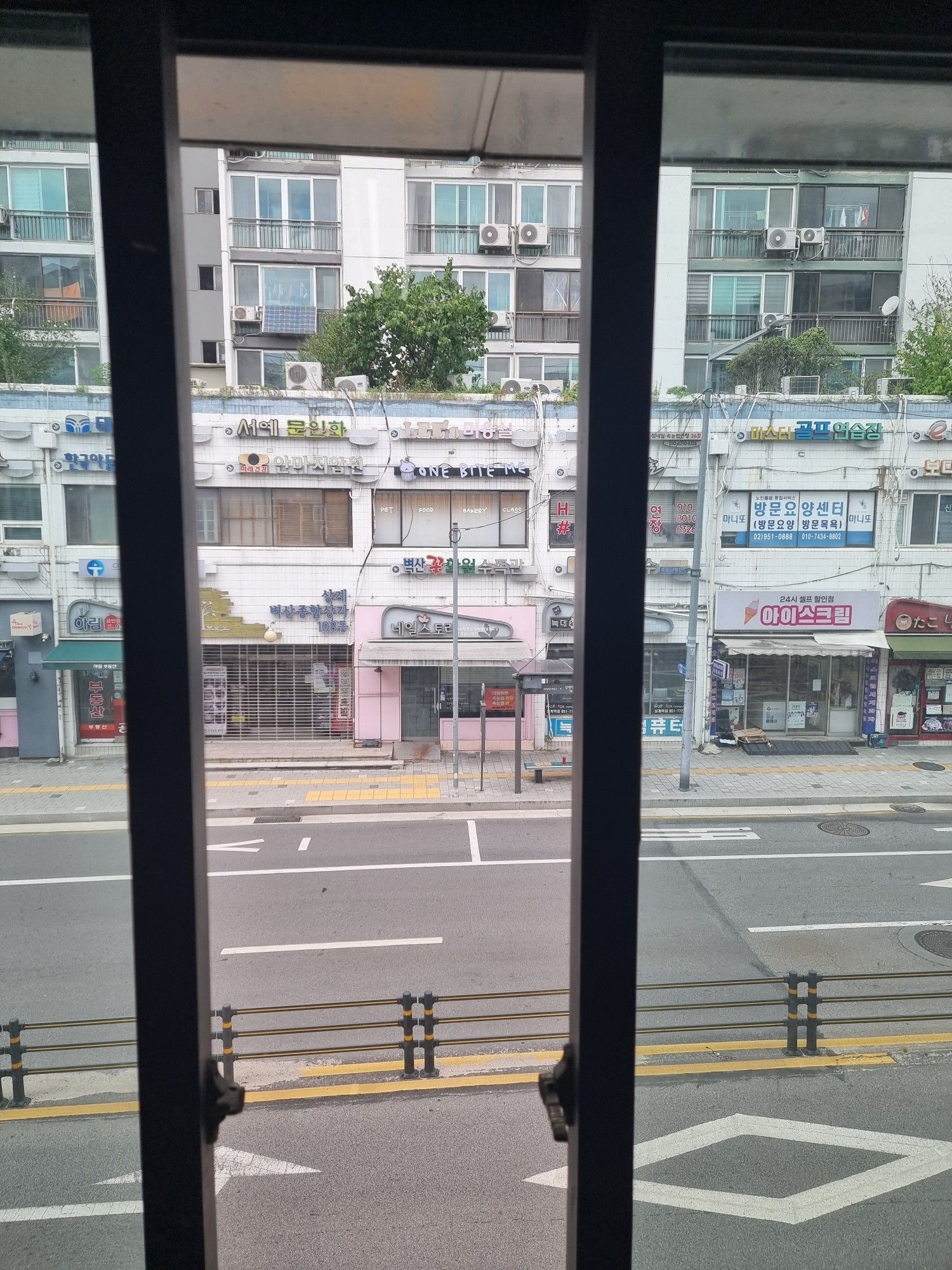 A view from an elevated subway station on a two storey shopping plaza in Seoul