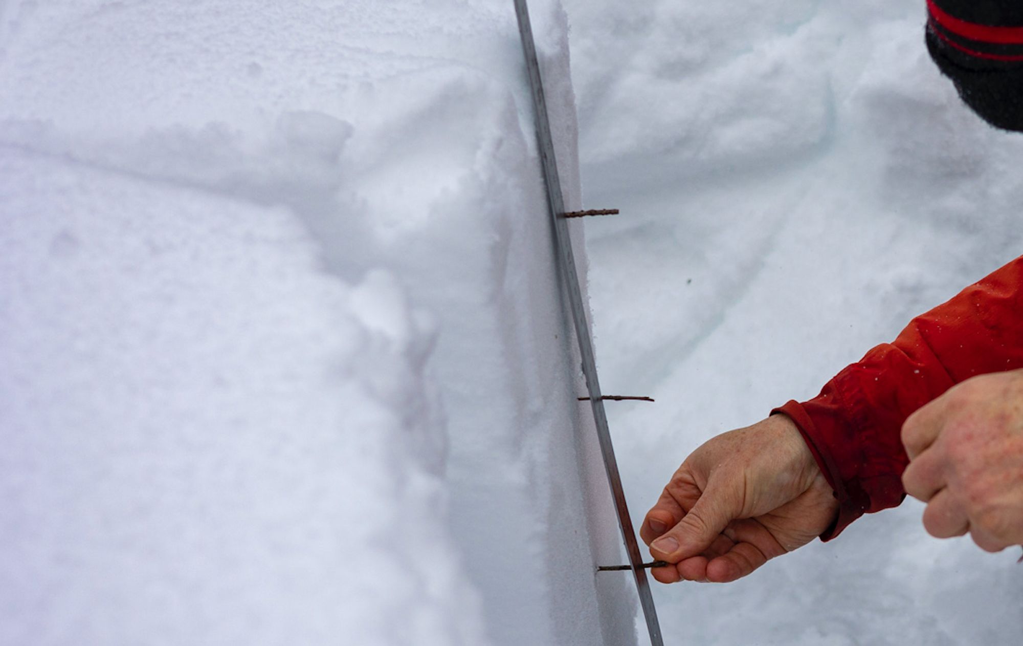 Close up of measuring snow.