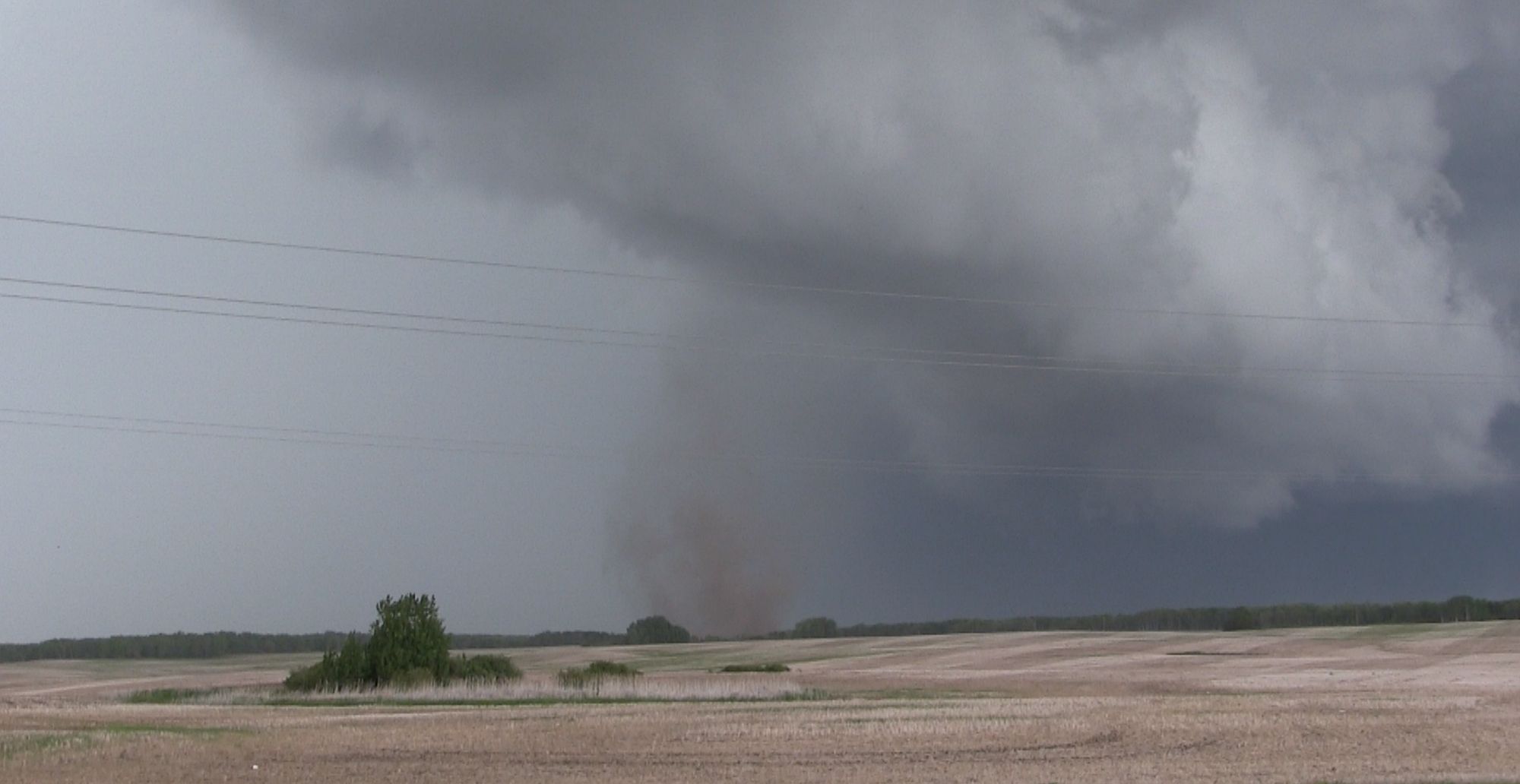 A very dusy, not completely condensed tornado.