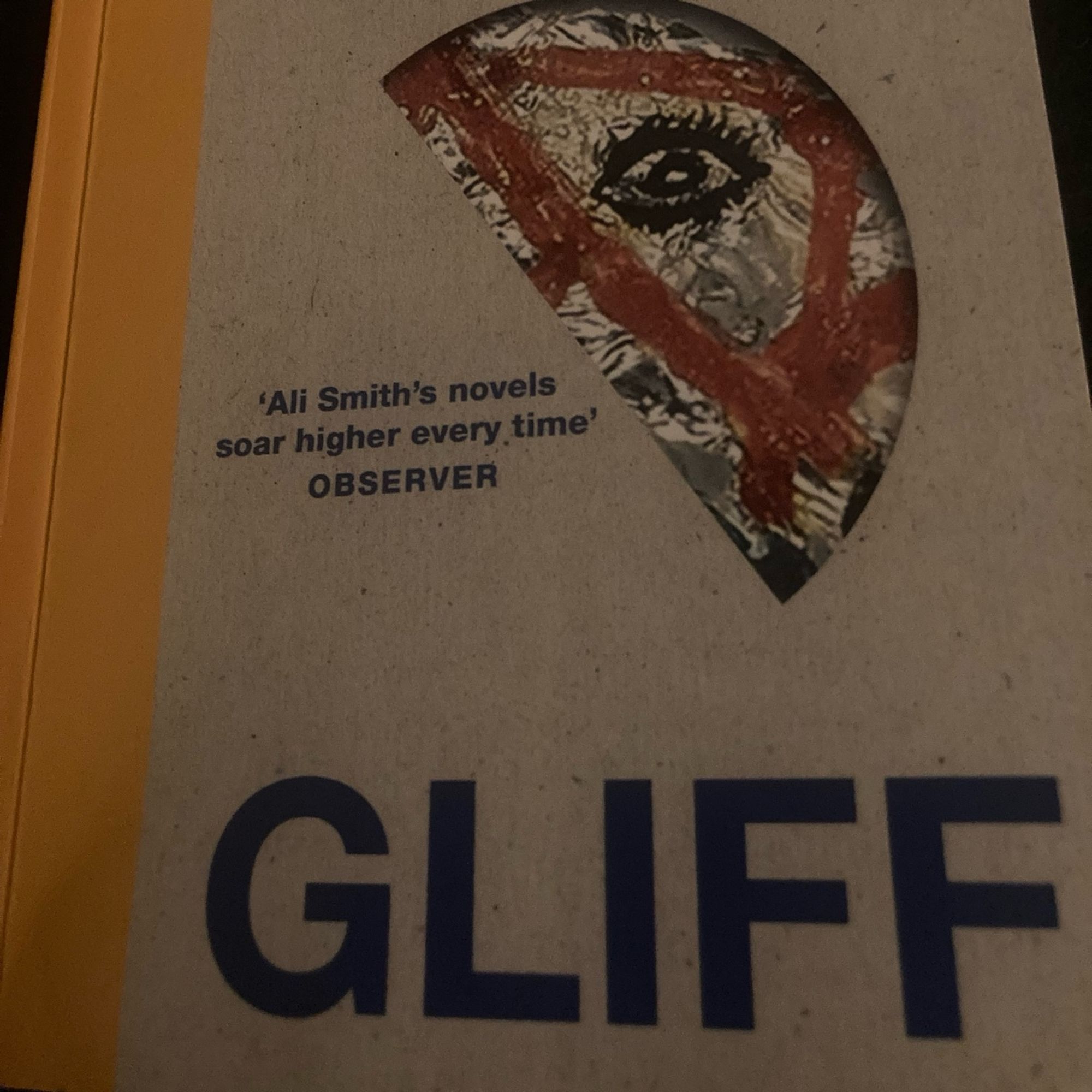 Front cover of new novel Gliff by Ali Smith shows what might be half a moon face.