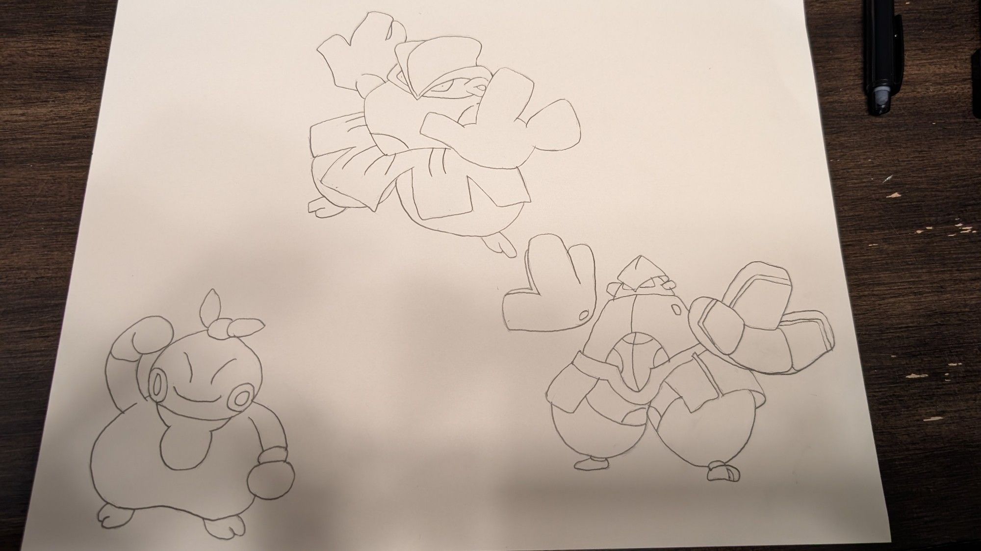 Pencil sketches on white paper depicting the pokemon Makuhita, Hariyama, and Iron Hands