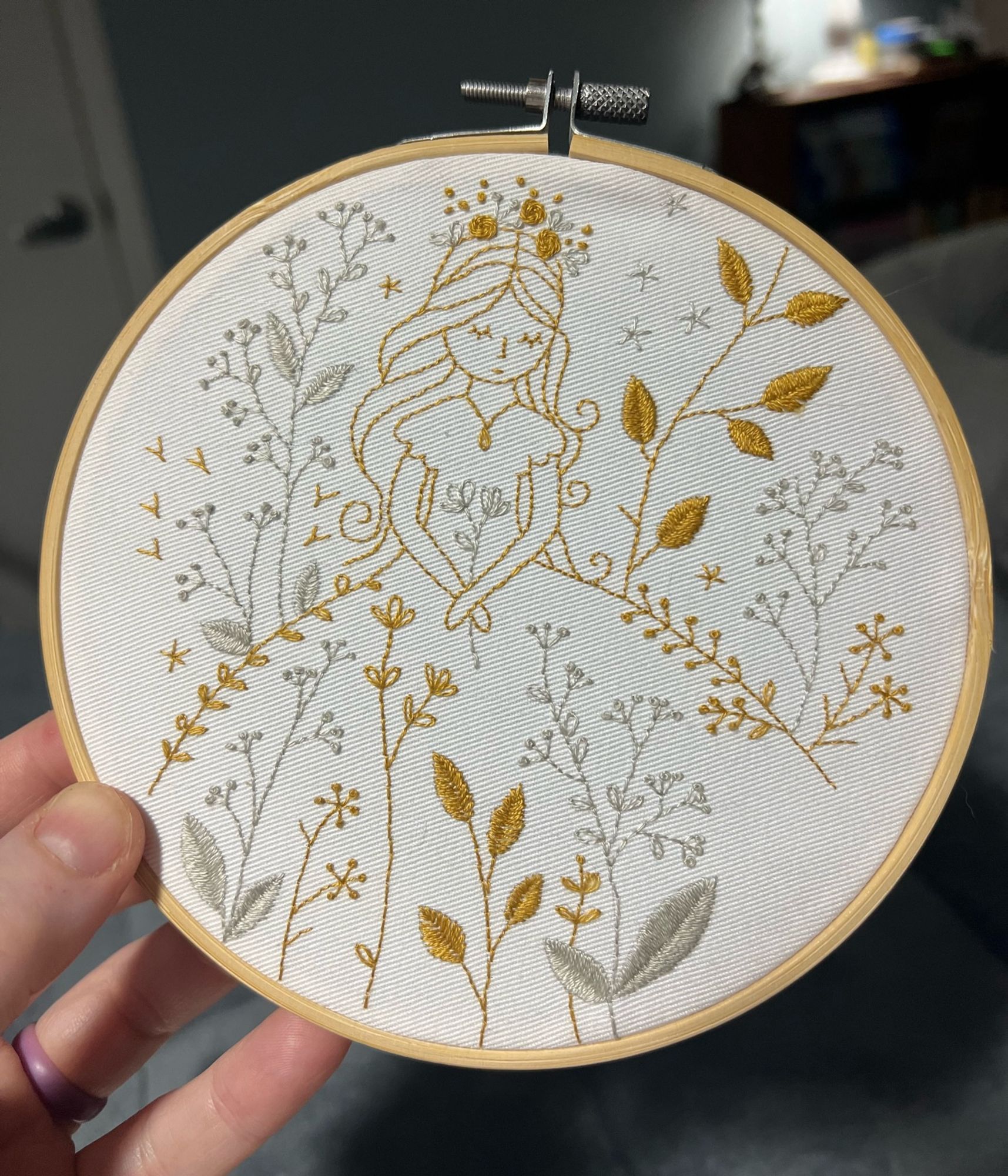 another gorgeous design from Tamar Nahir-Yanai at https://www.tamarny.com/ — a 6” princess surrounded by gold and gray wildflowers 