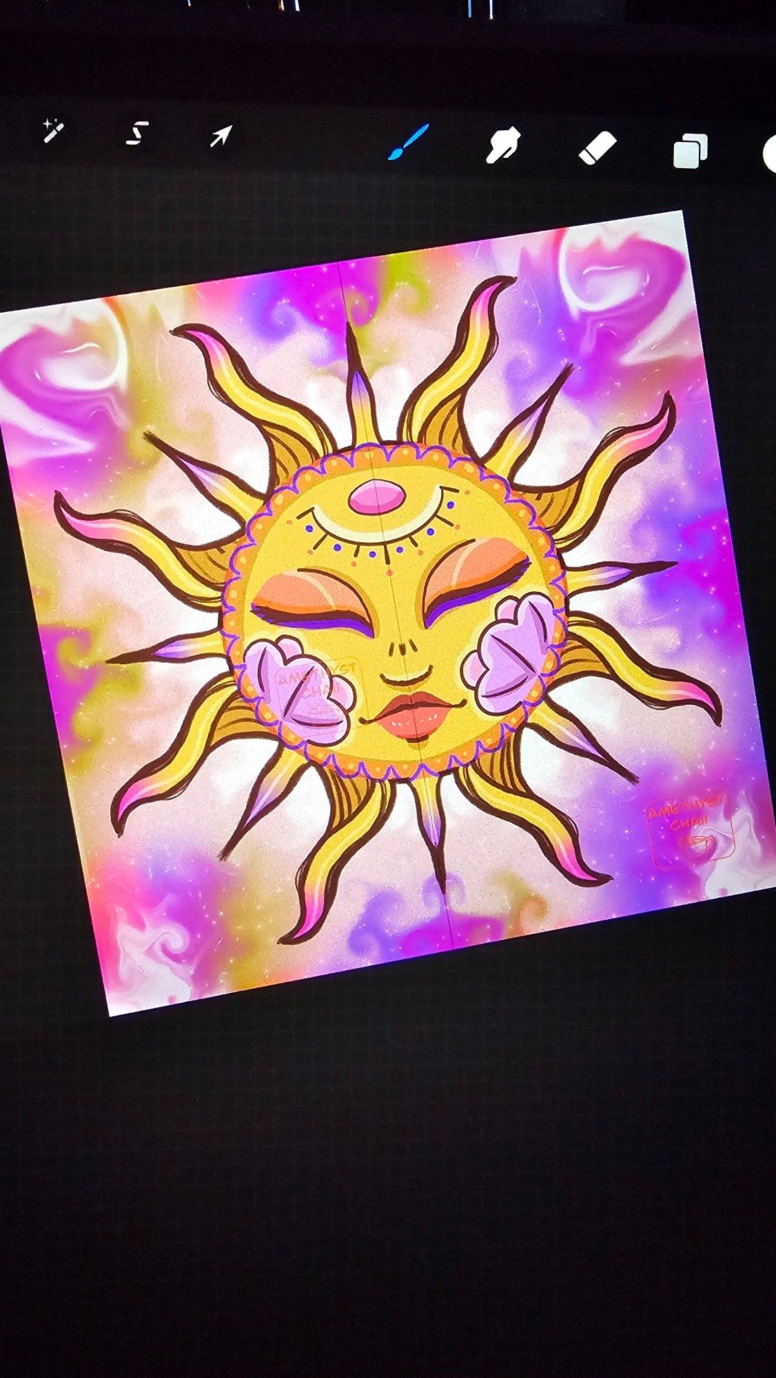 Vibrant sun drawing with purples and pinks surrounding it. Bohemian designs on the face of the sun with feminine features