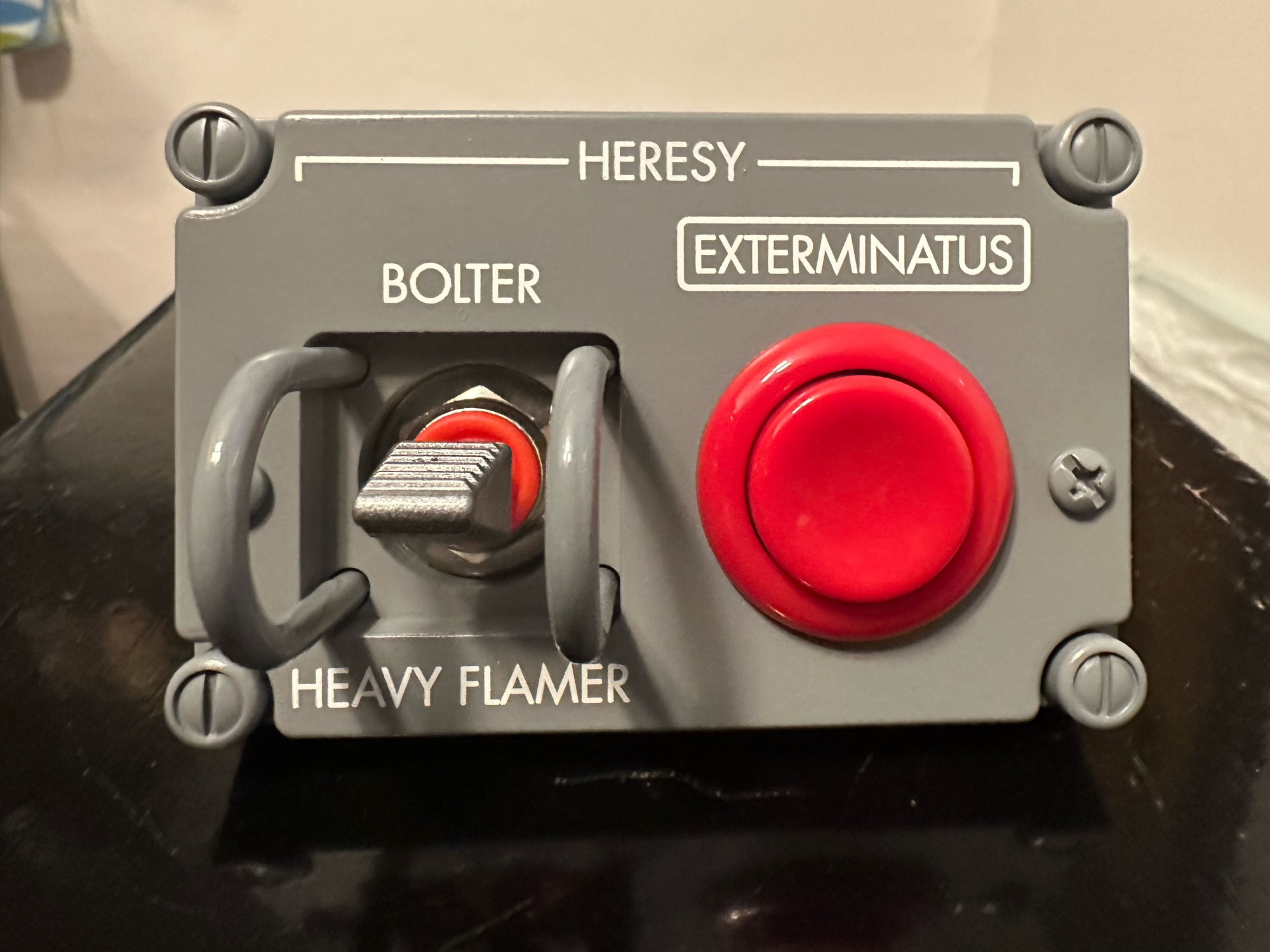 The Immediate heresy panel. Switch option of Bolter or Heavy Flamer with a large red slap button of EXTERMINATUS for when you really care to deliver. 