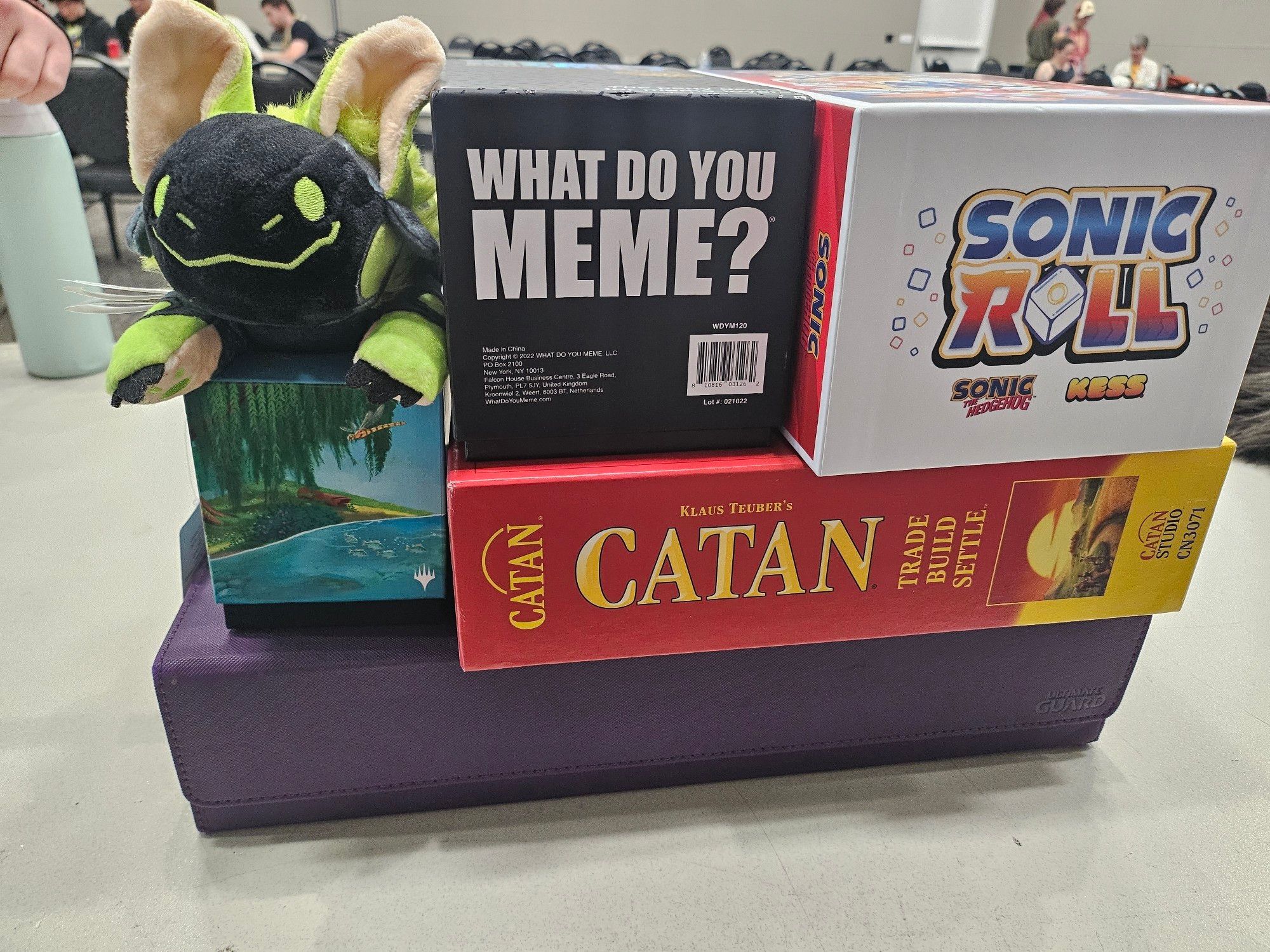 Tabletop games that Kiniro and myself lent to the department:
What Do You Meme?
Sonic Roll
Catan
My personal MTG cards
And a lime green protobean from Boss Monsta