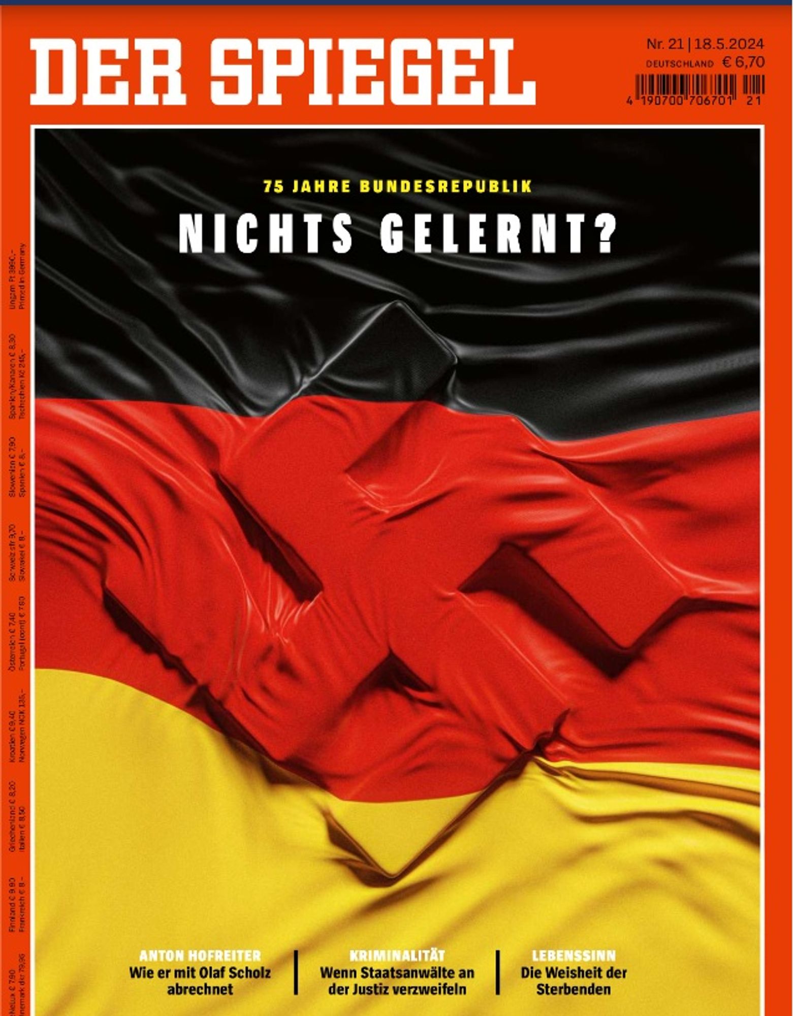 Magazine cover showing a German flag with the shape of a swastika pressing through from behind