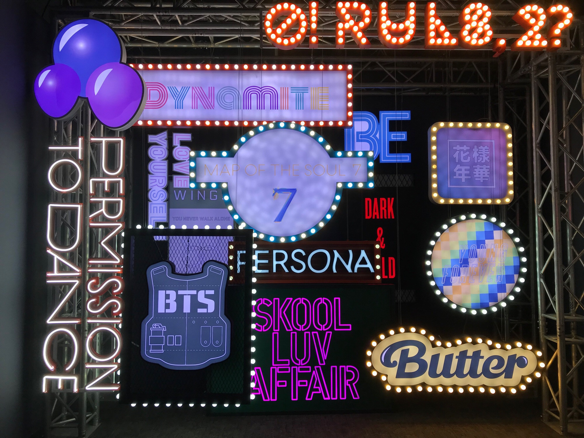 A collage of all of BTS’ ares in neon signs, much like in Jhope’s Outro: Ego music video