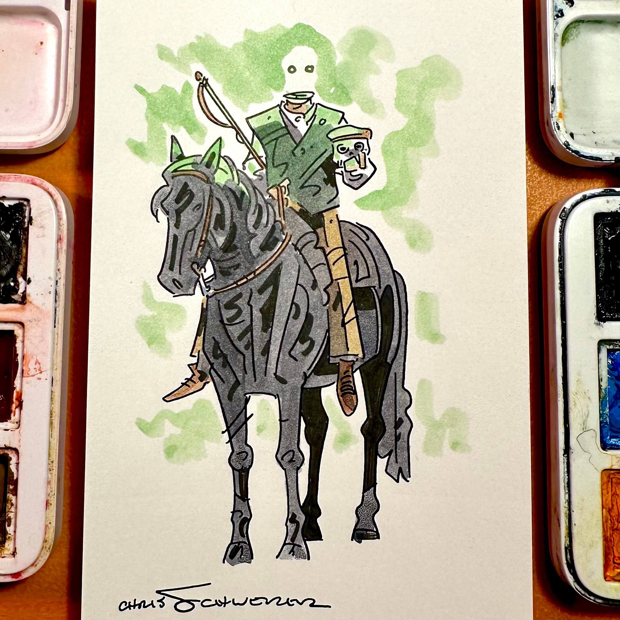 
Watercolored drawing of a man wearing a dark green vest and tan slacks riding a black horse. He holds a skull with a hat in his hand and above his neck float a pair of green eyes. The green splash of paint in the background leaves a negative space where his head would be.