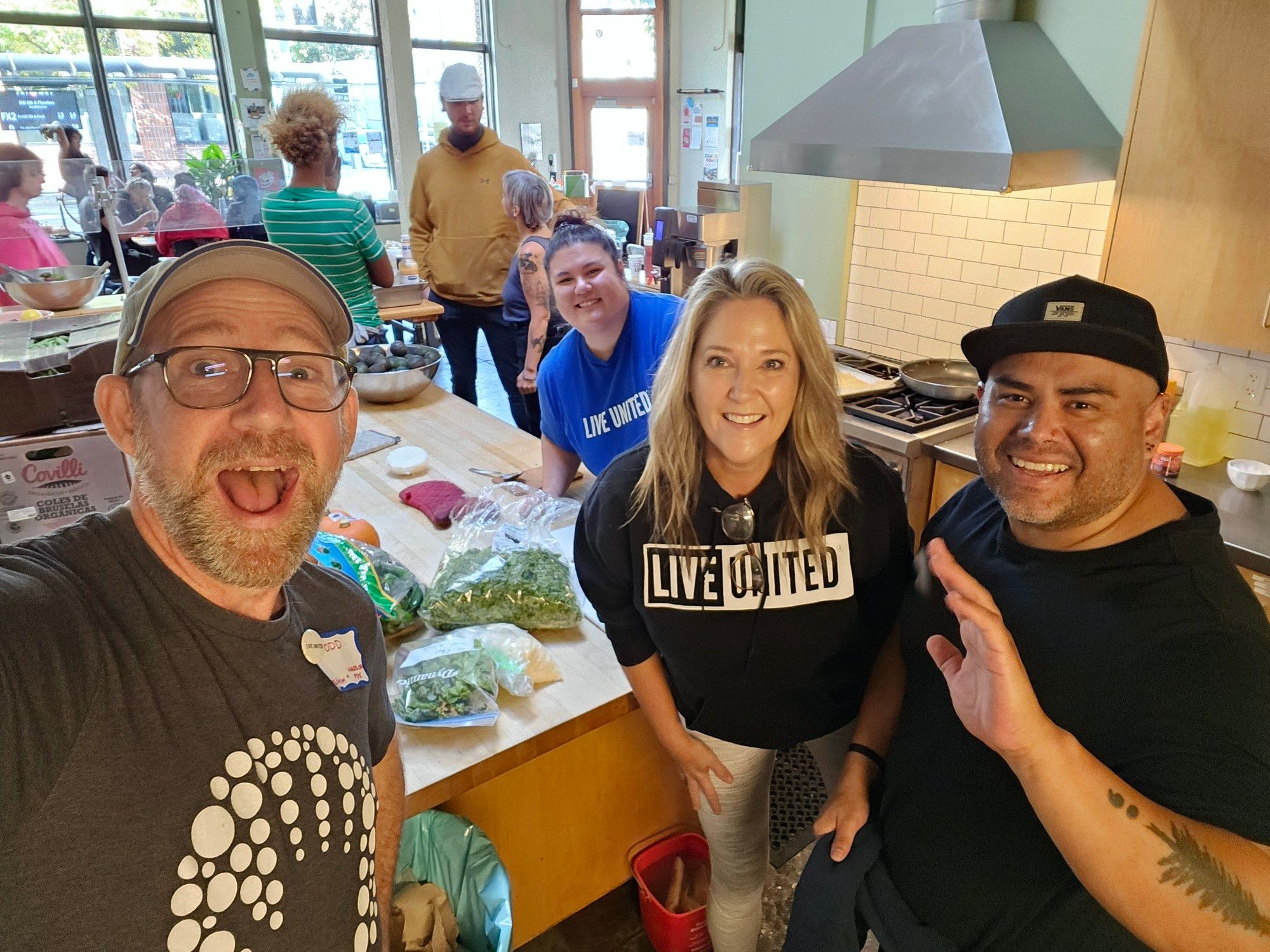 Me and our United Way team taking a photo moment in the kitchen