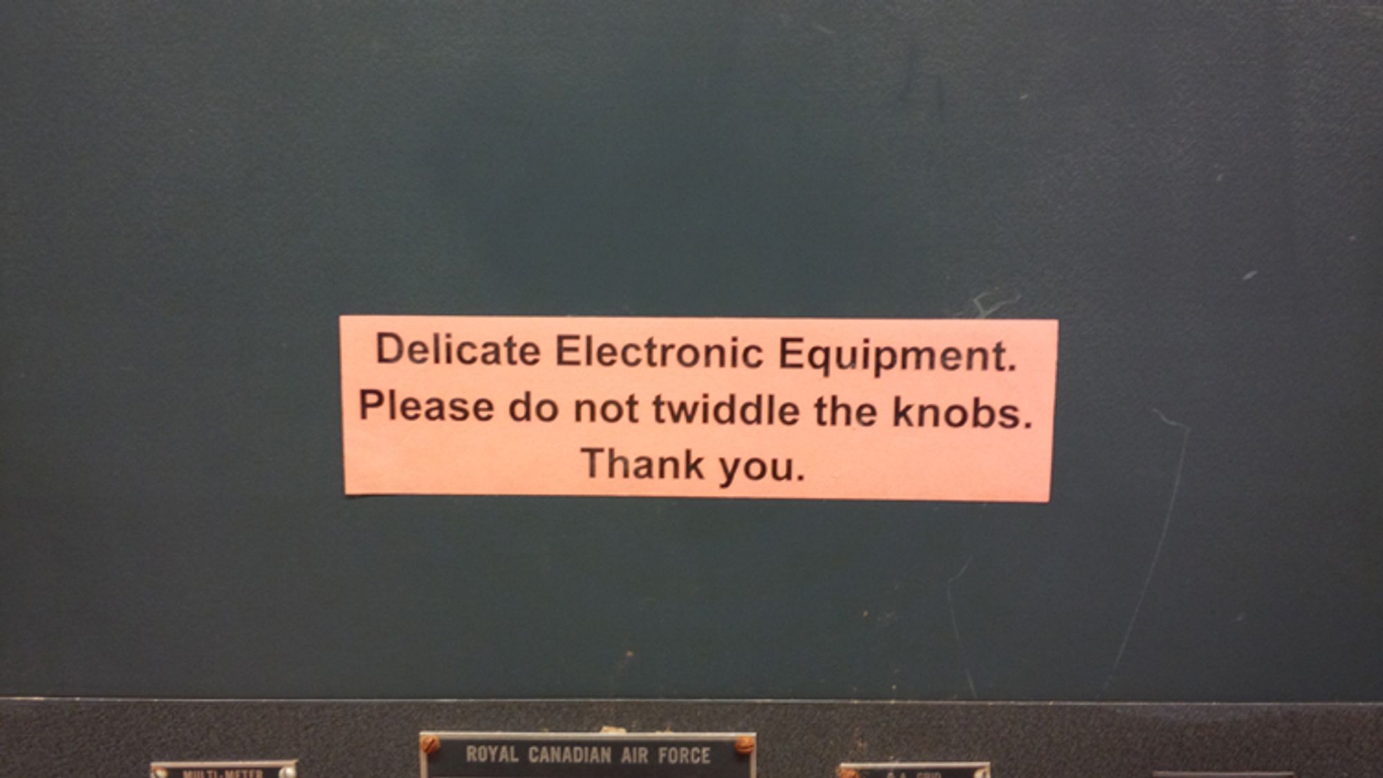 label on some electric equipment at the Diefenbunker, the cold war era nuclear bomb shelter for the Canadian government that says "Delicate Electronic Equipment. Please do not twiddle the knobs. Than you."