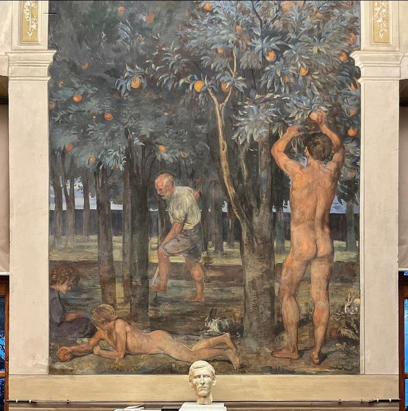 A painting showing a figure picking oranges from an orange tree, another lounging in the shade, and a third figure digging in the background