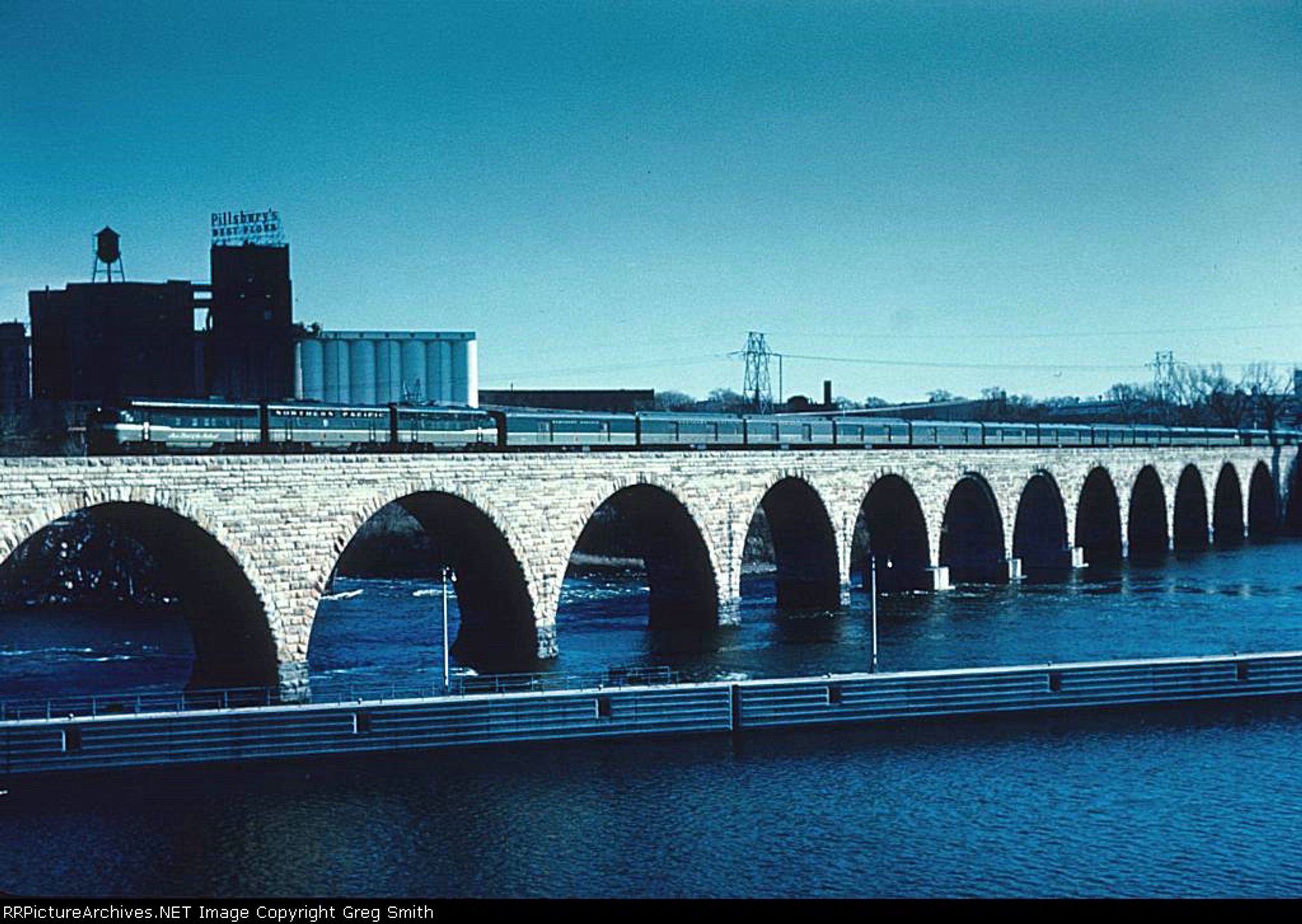 Photo of the Northern Pacific Railroad’s Mainstreeter train crossing the Stone Arch Bridge in Minneapolis in 1960