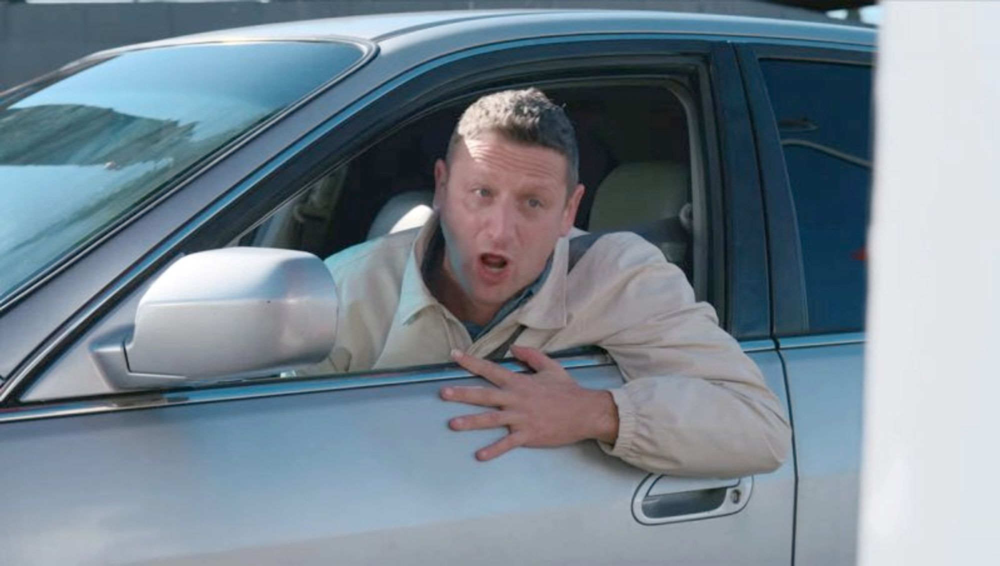 Tim Robinson yelling out his car window in I Think You Should Leave