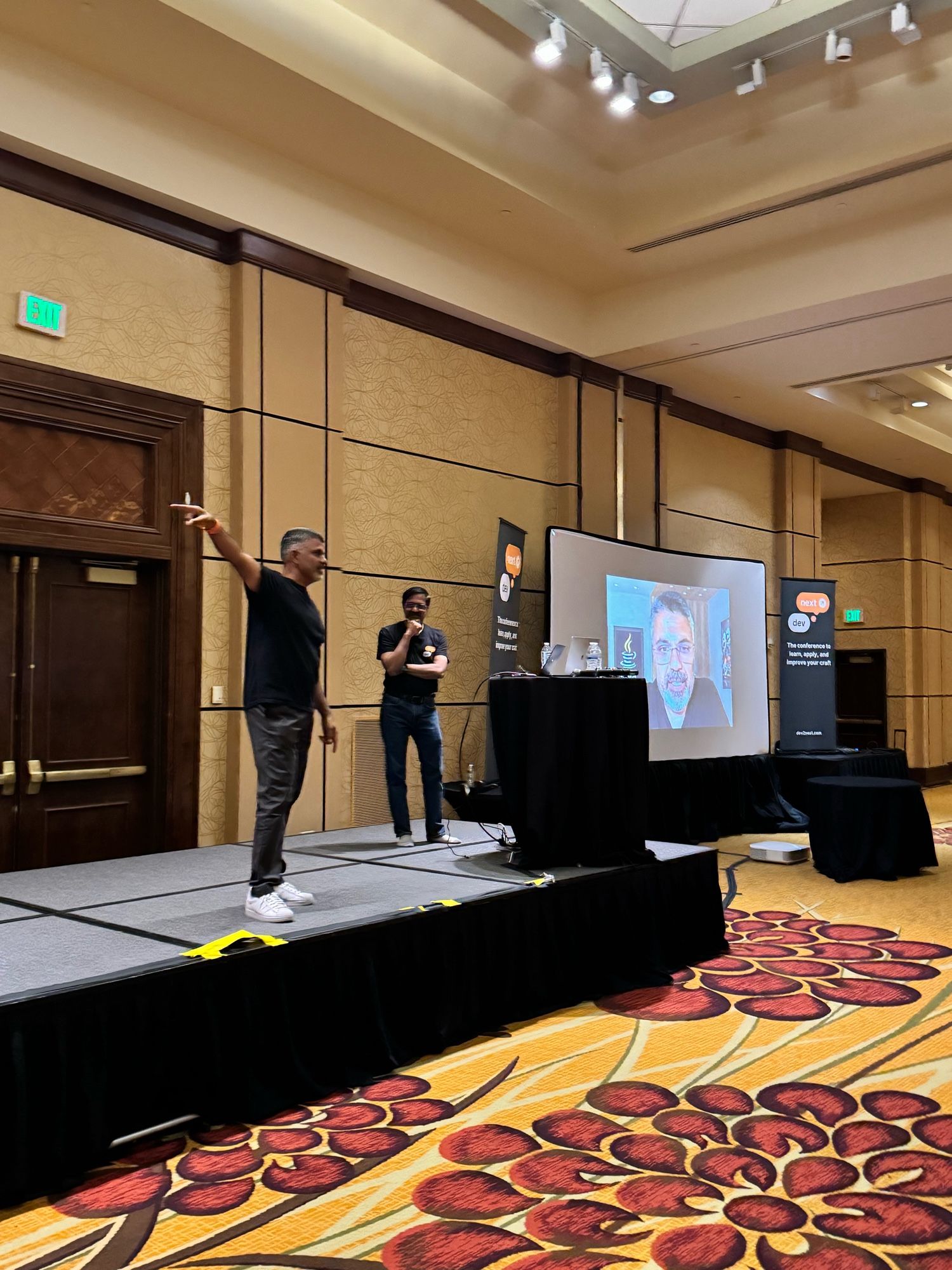 Sharat and Venkat on stage. Sharat’s photo is on screen