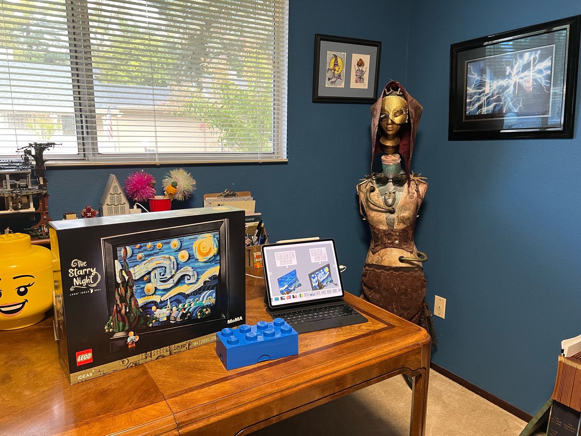 The picture showcases LEGO’s Starry Night box sitting on a desk. You can also see the steampunk/Borg mannequin I made several years ago in the background. If you look to the left, you can see a tiny portion of LEGO’s The Upside Down.