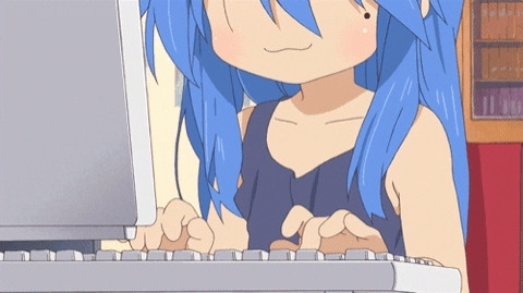 Konata Izumi from Lucky Star using a computer