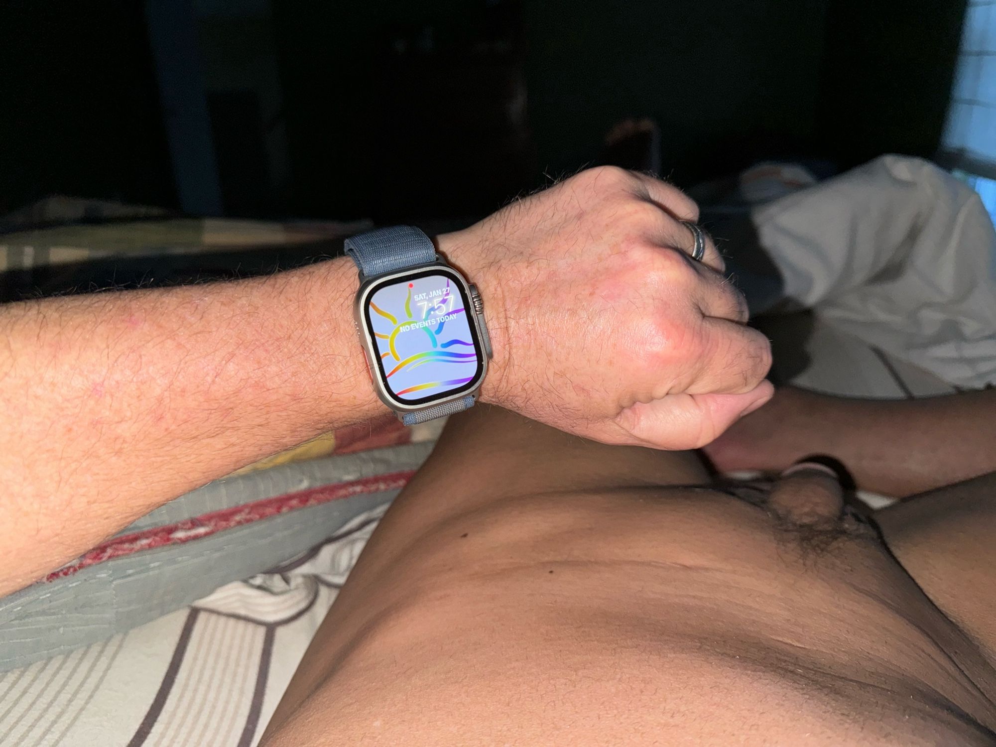 Nude male lounging in bed displaying the rainbow naturist symbol as his Apple Watch face. 

#NormalizeNaturism
#NudePride
#NonSexualNudity