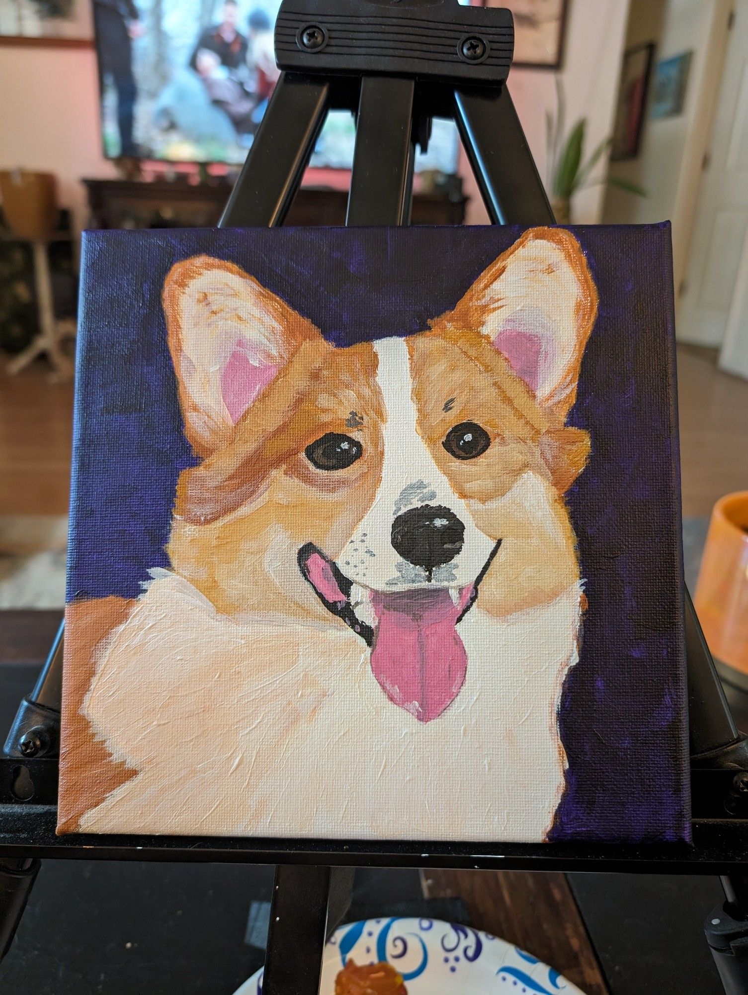 A painting of the photo of the corgi with a purple background