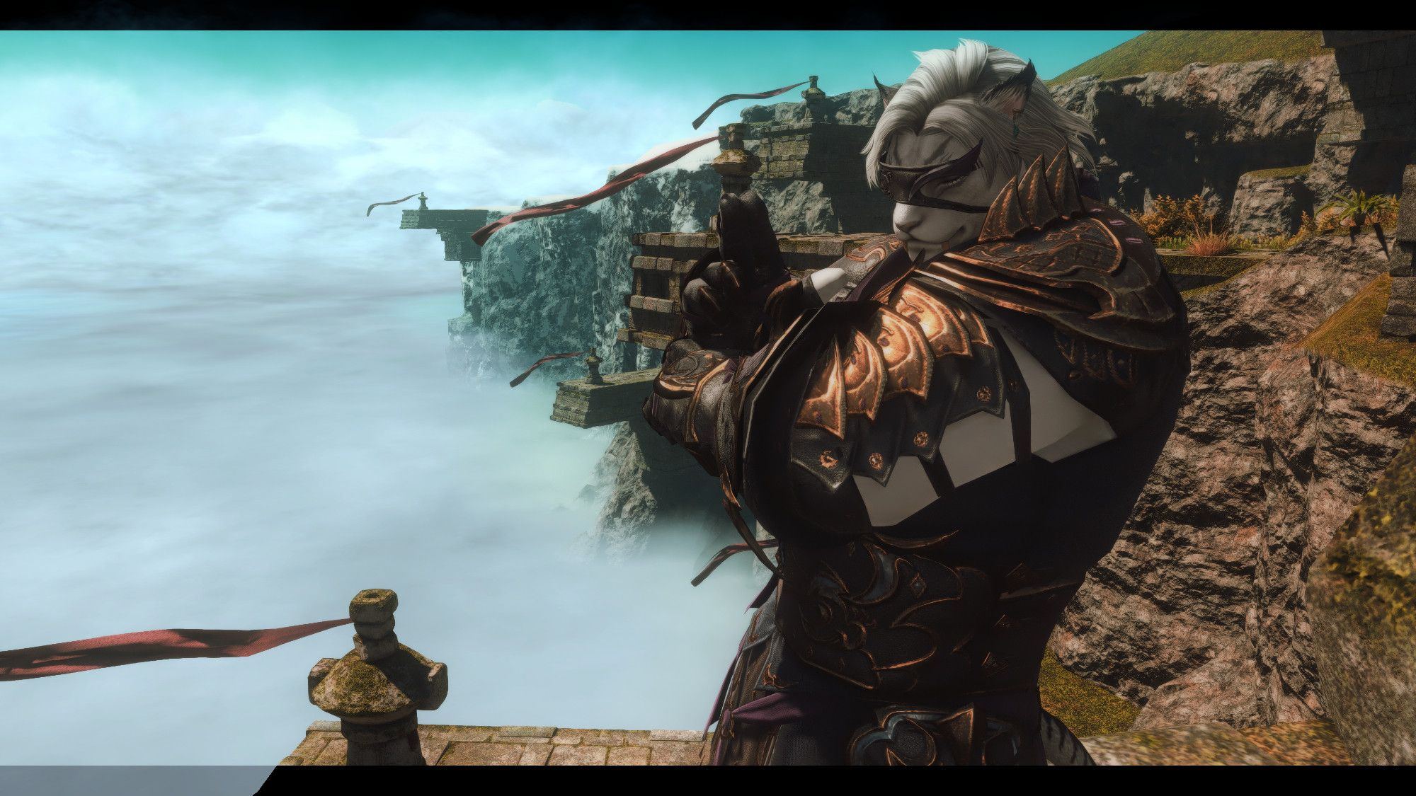 A screenshot from Final Fantasy XIV depicting a male Hrothgar with white fur and a greyish white mane of hair. He's standing with his left side to the camera, his hands in front of his body. Left hand has two fingers raised as part of a Ninjutsu hand sign. He is wearing black leather armor with dull-bronzed plating on the forearm and shoulder, and a matching color trim along the rest of the body.  Over his face is a partial mask that acts as a blinder over his right eye, his left eye exposed. 

Behind him is a stretch of mountain rage with various stone markers, each with a long, red banners flowing in the wind