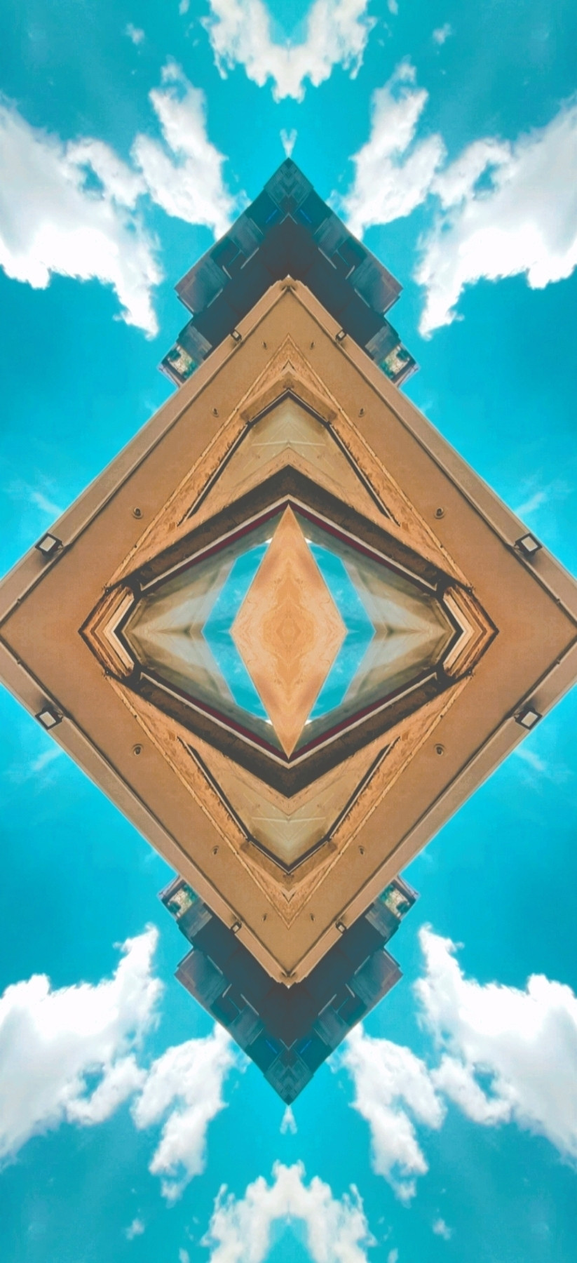 Kaleidoscopic image of a stone wall and irom frames surrounding a wooden window frame. Clouds and clear sky surrounding it all. 