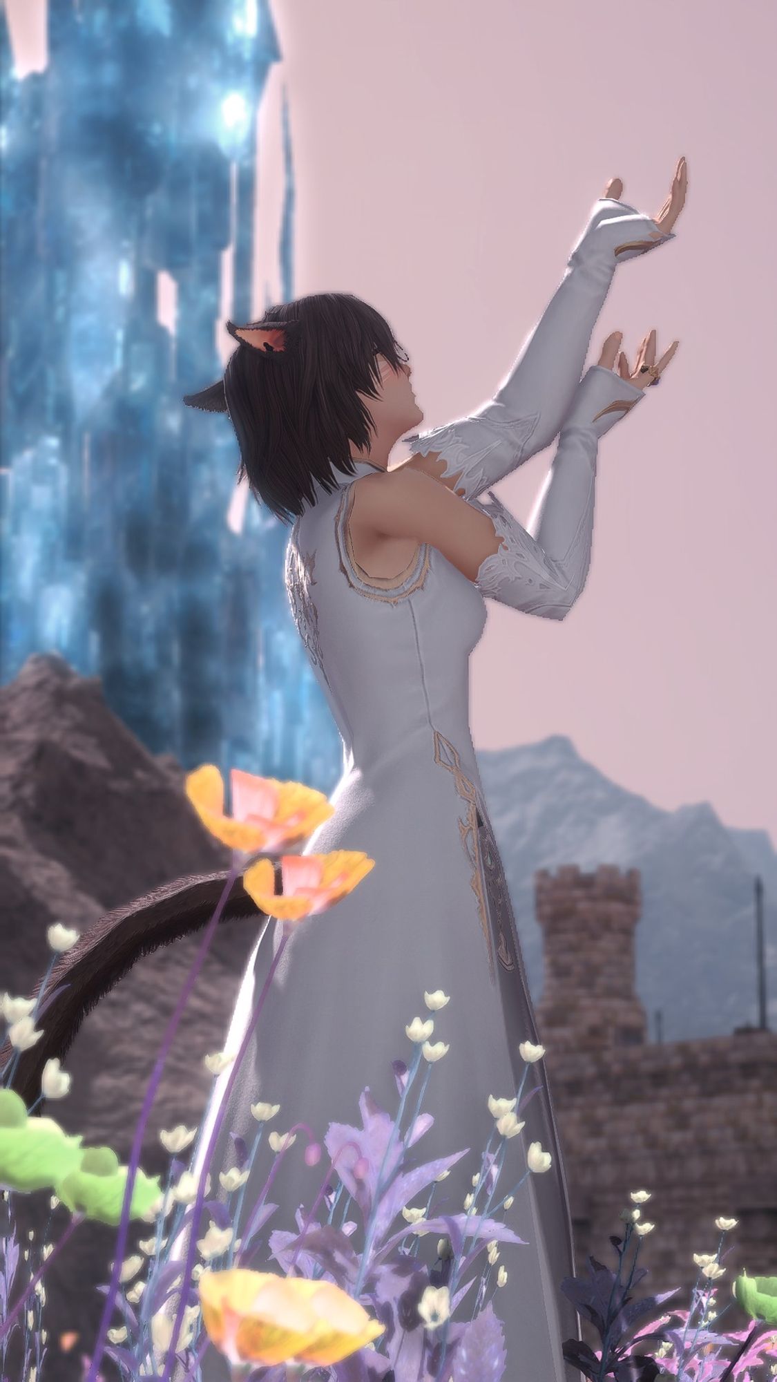 a side angle shot of a brunette miqo'te woman clothed in white standing in front of the crystal tower, surrounded by flowers. her arms are raised in front of her as if in prayer