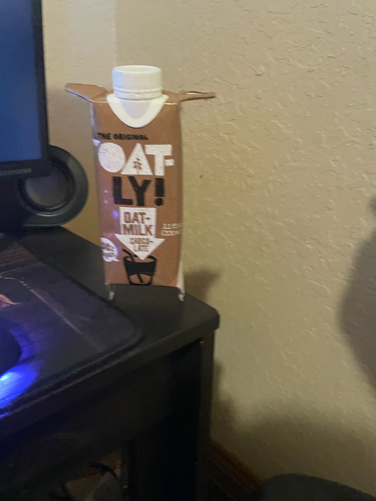 standing bottle of oat milk 