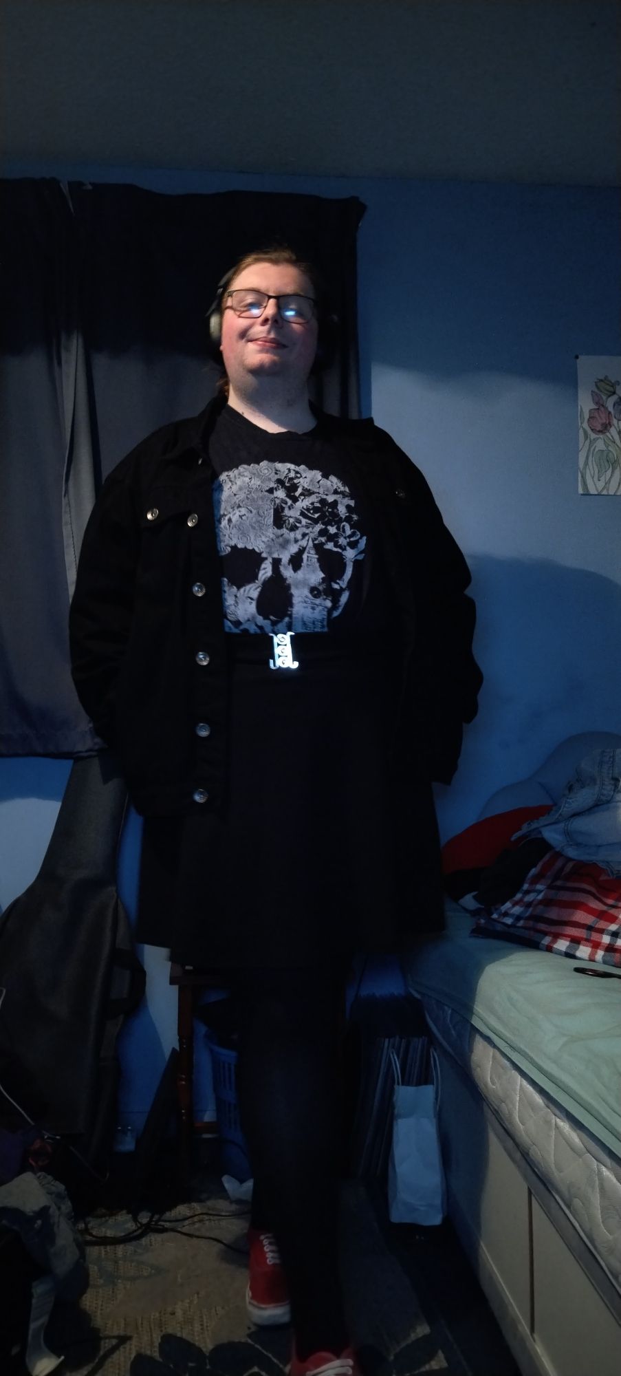 Me Wearing A Black T Shirt With A Skull, A Black Denim Jacket, A Black Skirt, And Black Tights