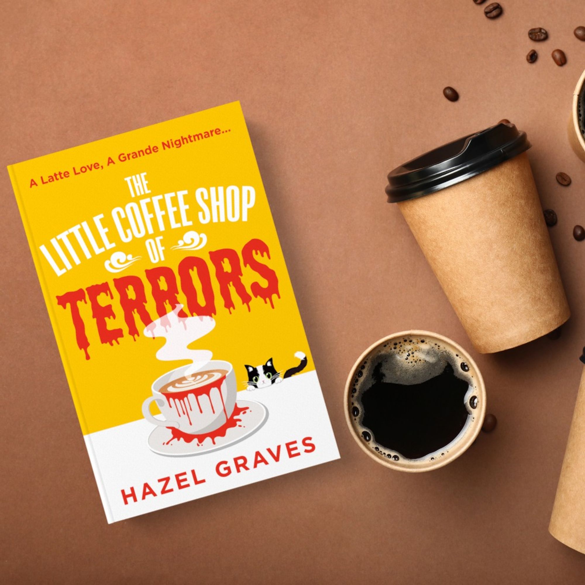 The Little Coffee Shop of Terrors, which is BRIGHT YELLOW and features a bloody coffee cup and a cute cat