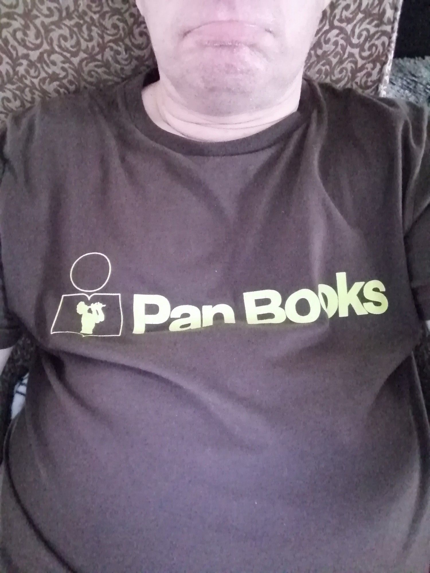 Me wearing my Pan Books t-shirt.