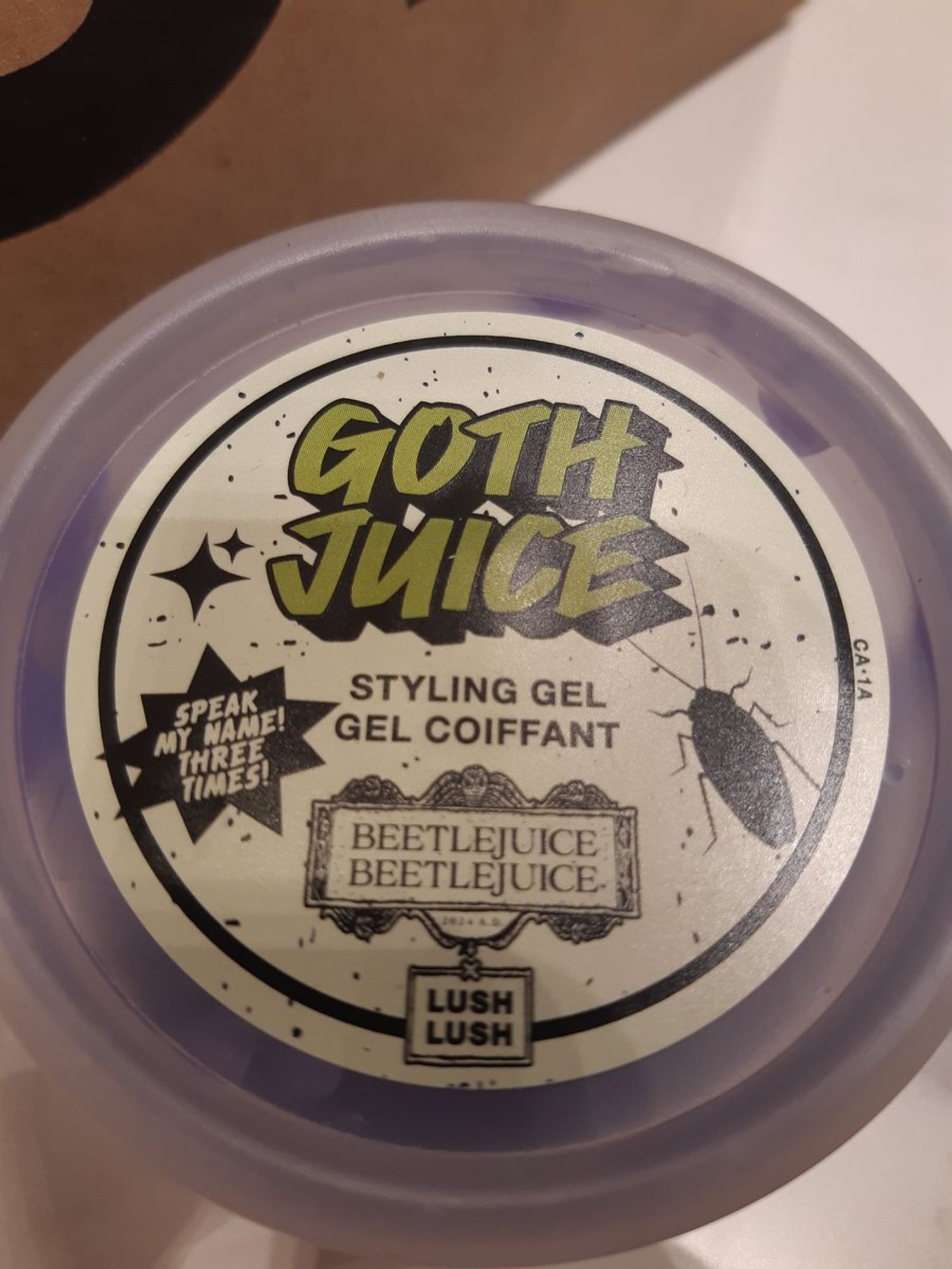 a tub of "Goth Juice" hair gel from Lush Cosmetics